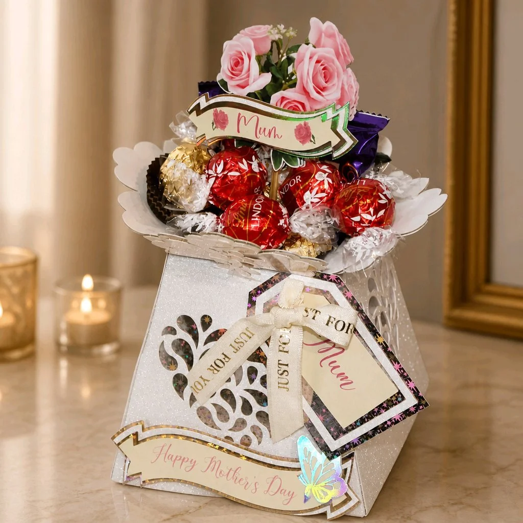 A coordinating gift tag is attached, ready for a personalised message to make the gift even more meaningful. Vase is filled with your favourite sweet treats to suit Mum for a bespoke, thoughtful present. Designed to sit beautifully on a mantel, windo