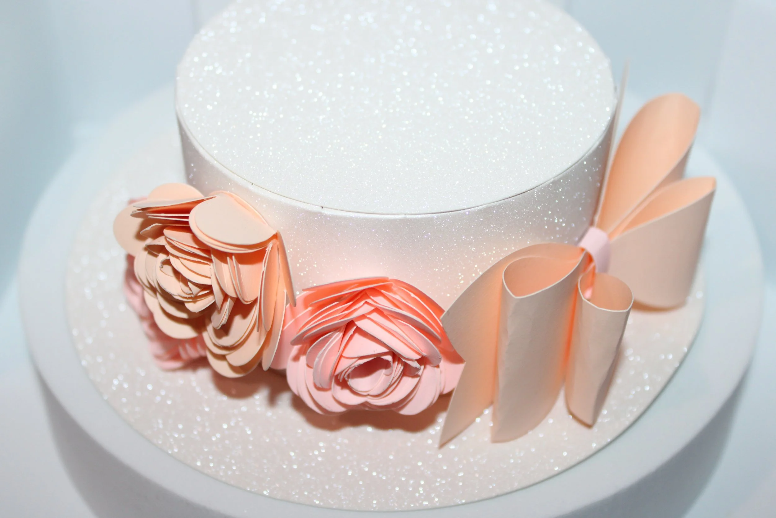 Hat Favour Box!
This wedding favour box is shaped like a hat, crafted in white glitter card. 

It's a charming addition to any special occasion. #0081

