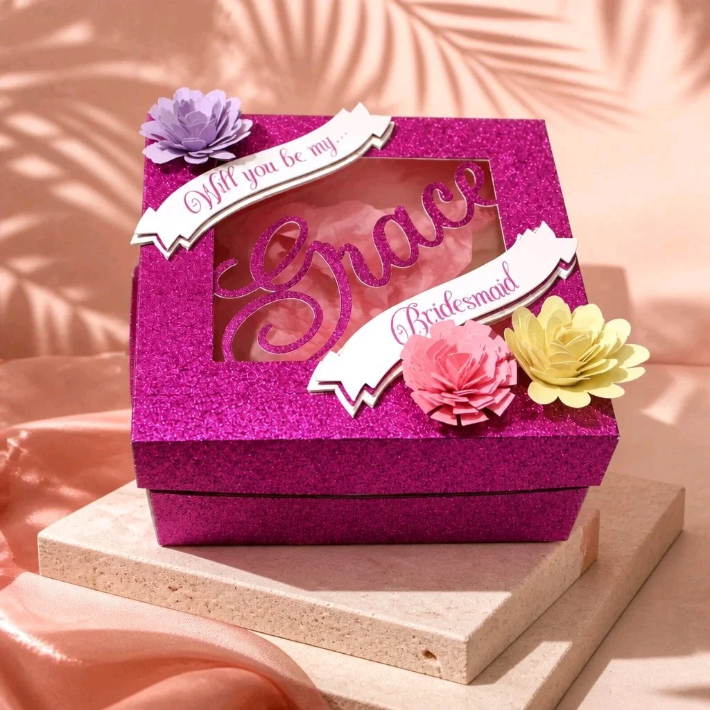 The perfect gift box! Ask your best friend/family member to be your bridesmaid or maid of honour with one of these cute gift boxes. The boxes have their names intricately cut on to the lid. In addition there is also a flower that is cut out of glitte