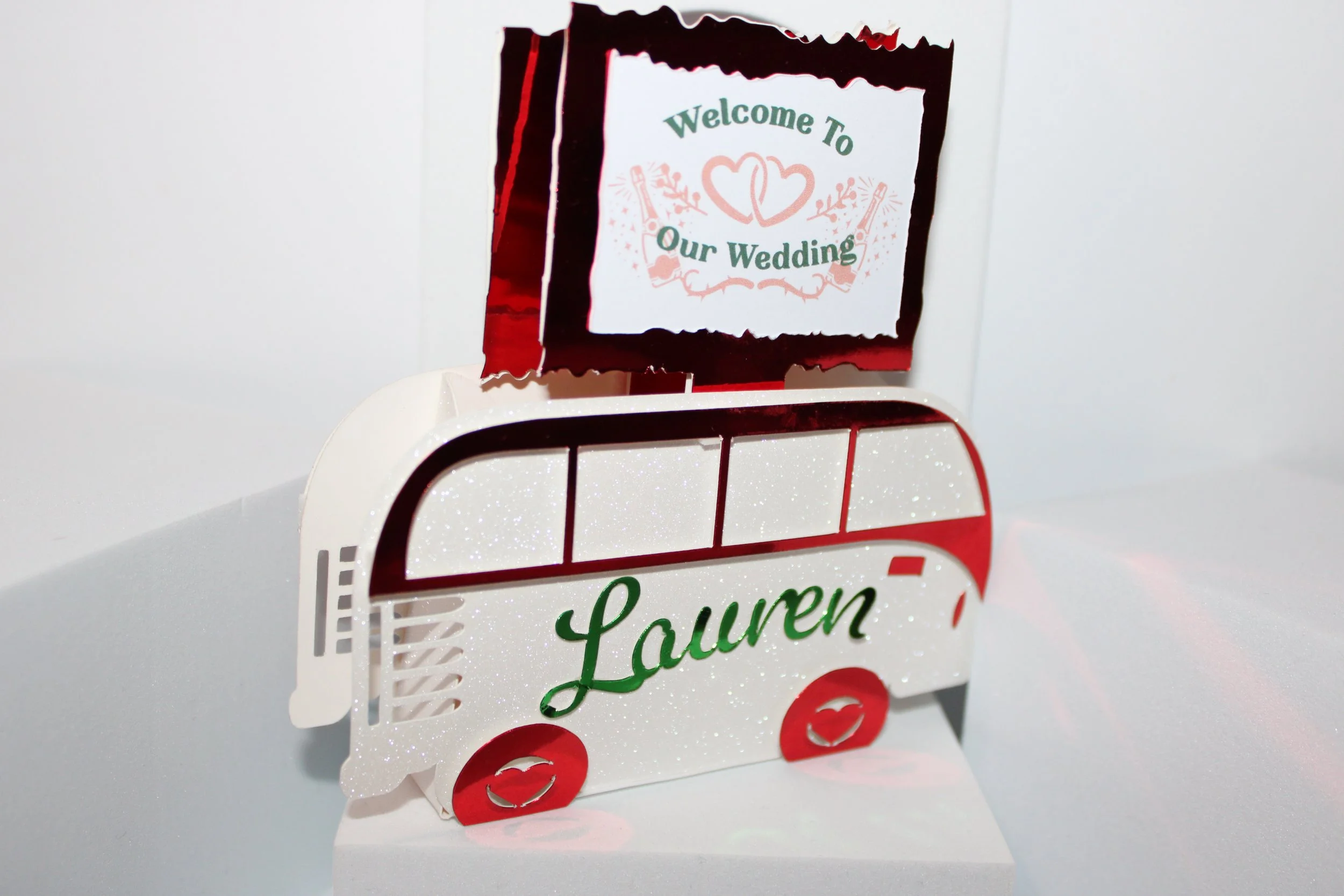 Red metallic campervan favour box!
These gorgeous campervan favour boxes will have you captivated. They have been crafted in a shimmering white glitter card & finished in a stunning shiny red metallic card.
Perfect for that campervan theme. #00122