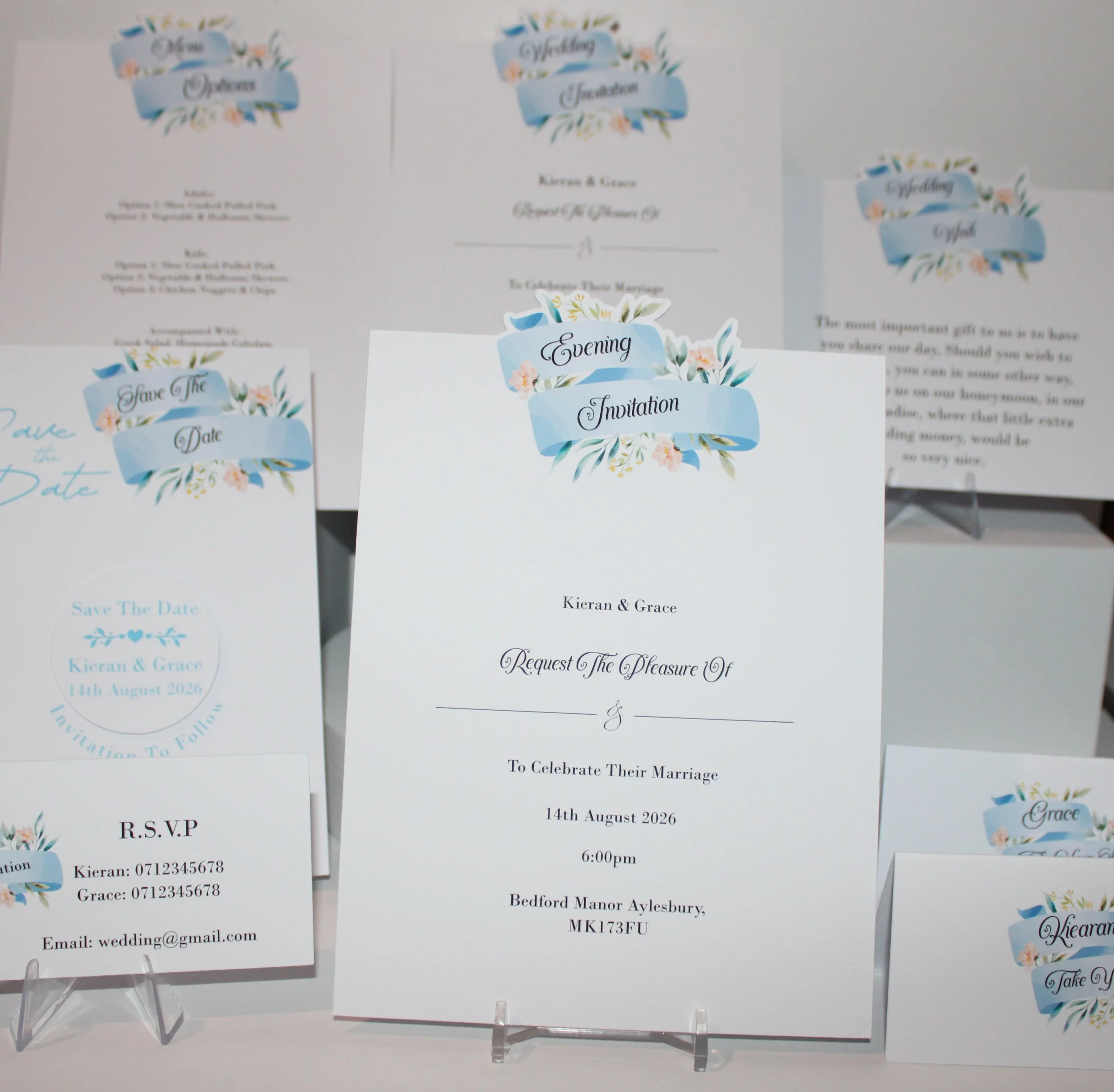 PRINTED BLUE FLORAL SCROLL INVITATION PACKAGE! 
These invitations have an elegant pink rose printed onto either pearlescent or white card. Simply stunning stationary that is pleasing to the eye. What's included! Save the date with aluminium disc plus