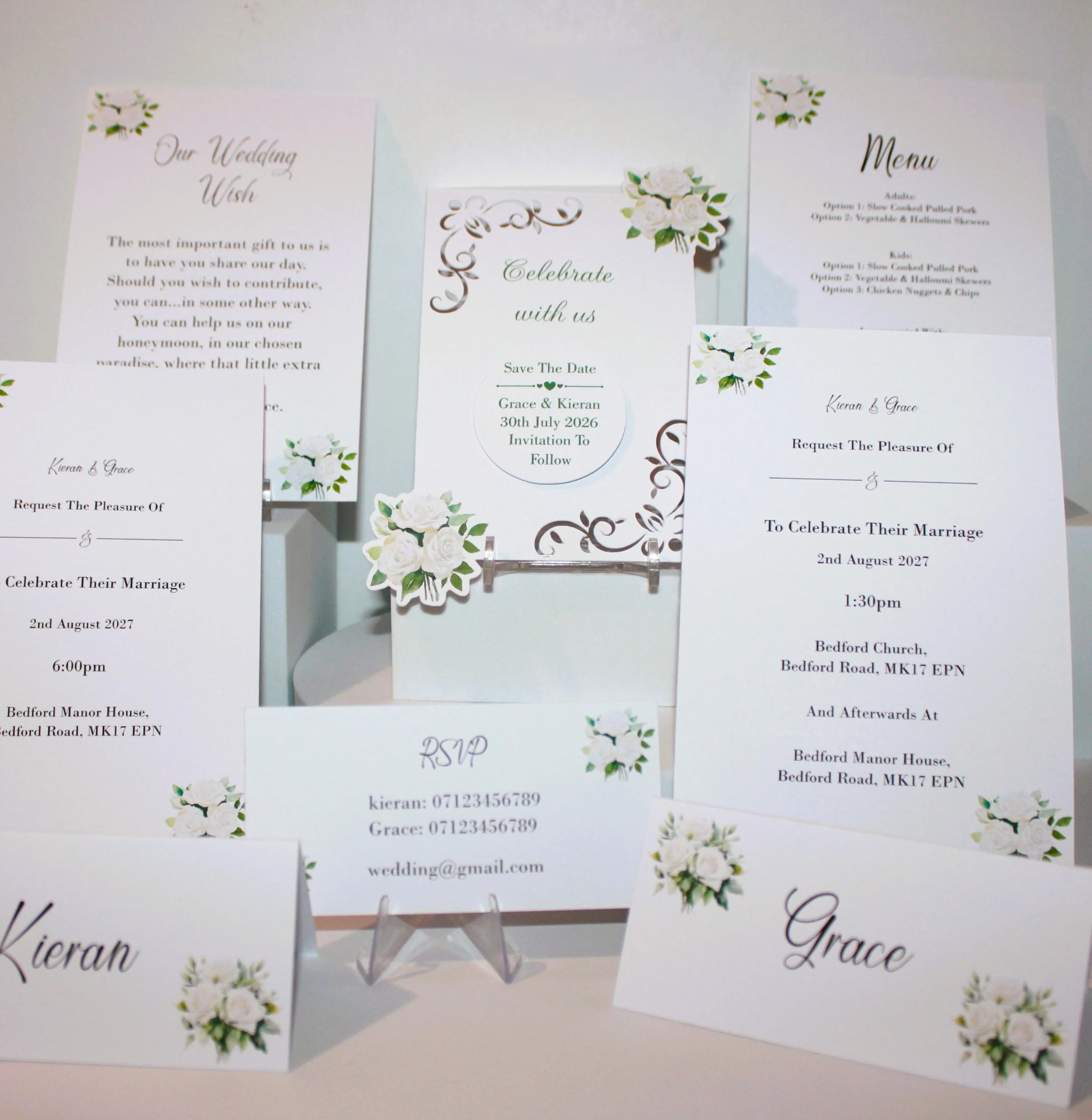 PRINTED WHITE ROSE INVITATION PACKAGE! 
This package offers a comprehensive set for your special day. Each card offers a beautiful finish adding a touch of sophistication. white roses are printed on each card enhancing the aesthetic appeal. The packa