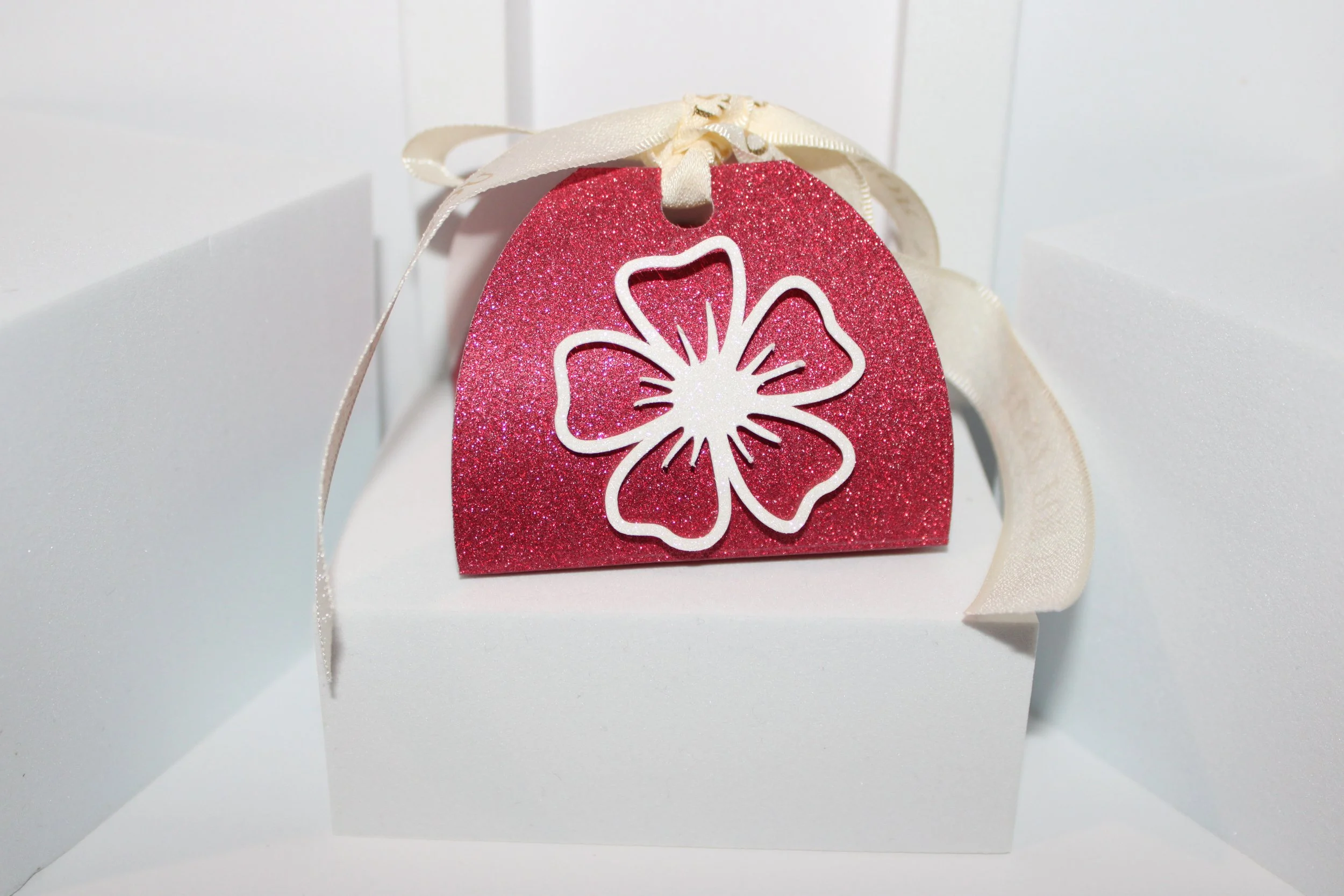 Each one has a gorgeous silk ribbon flowing from the box, giving it that perfect finishing touch.