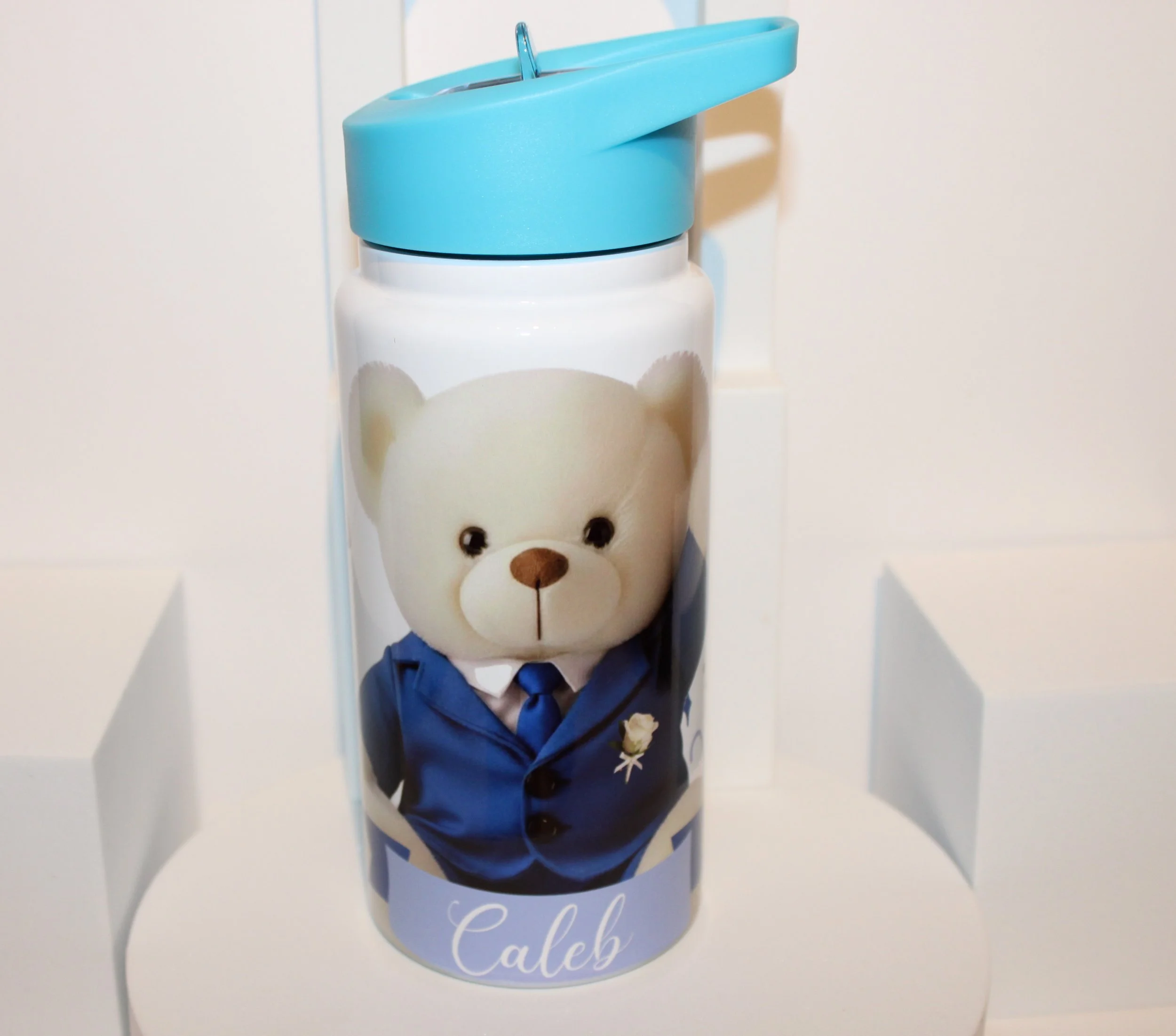 Page Boy Water Bottle!
Personalized water bottle featuring a sweet message from the bride and groom and a printed image of a page boy teddy. #0089