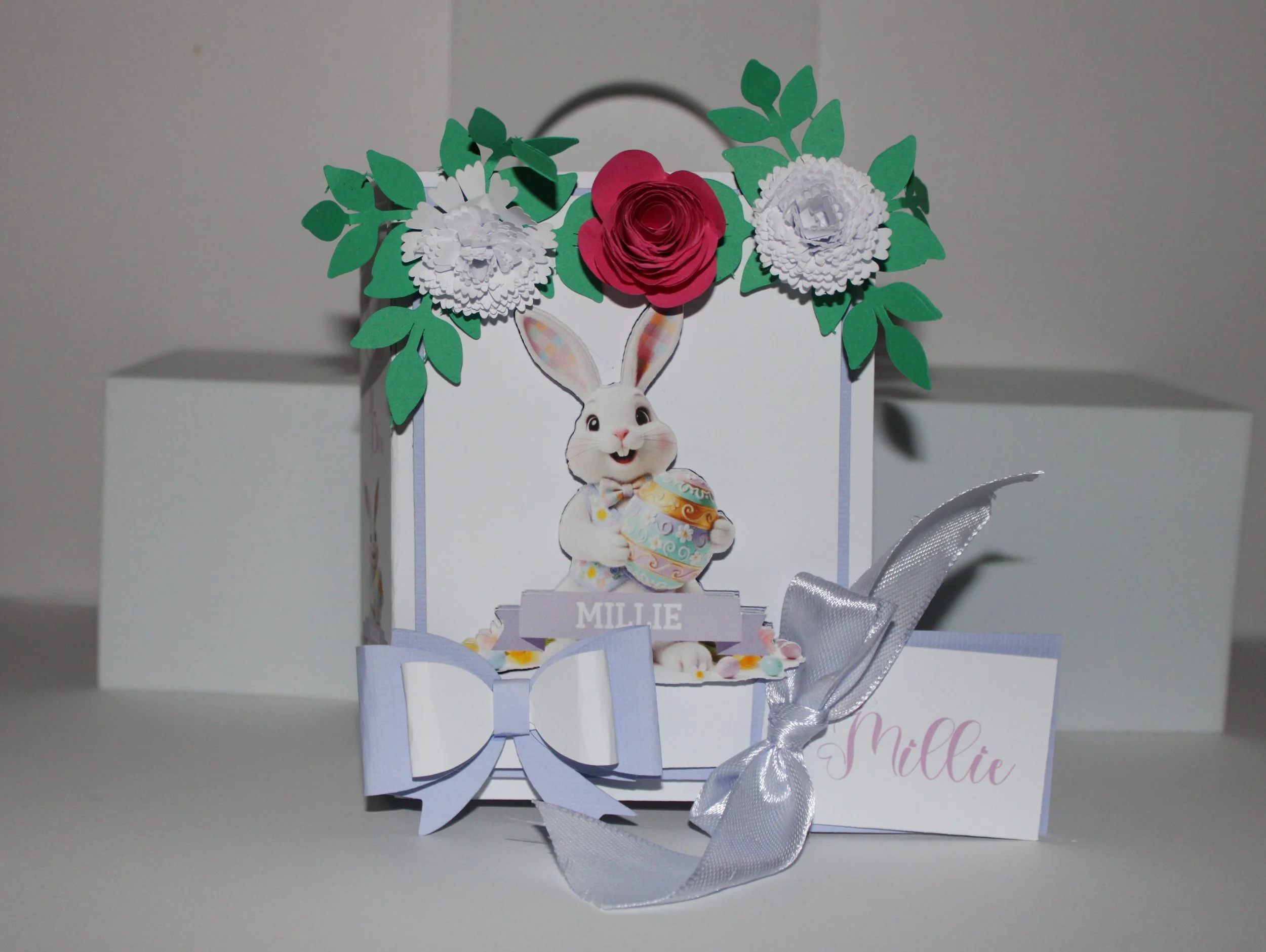 Easter Gift Box For Her! 
Easter gift box shaped like a book, handcrafted with care and charming details. The cover features an AI-generated bunny illustration, precision-cut and layered for a dimensional look. #00172
