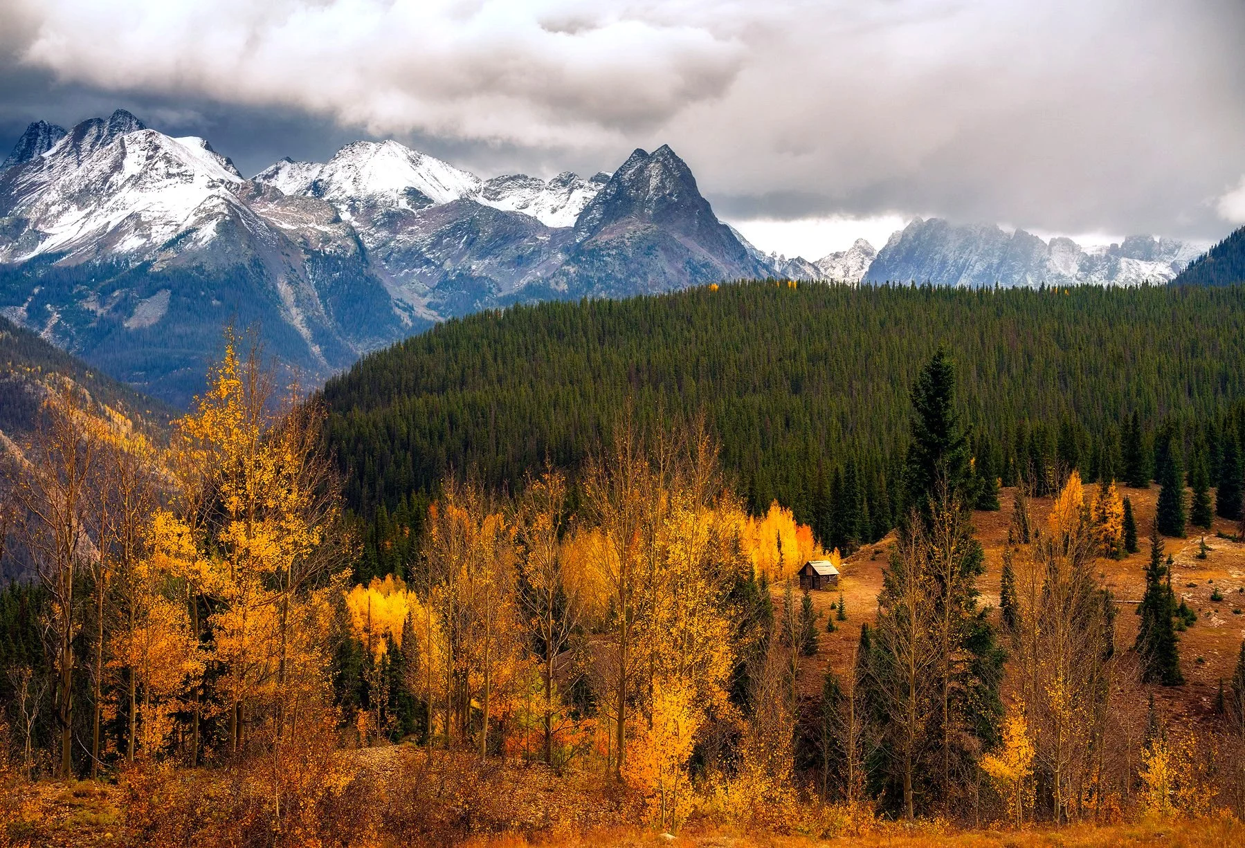 Grenadier and Needle Ranges with an old cabin from an overlook near Molas Pass