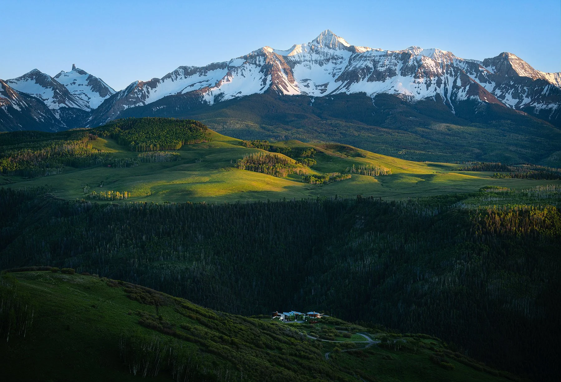 This house has a multi-million dollar view of Wilson Peak, Lizard head Peak and El Diente Peak