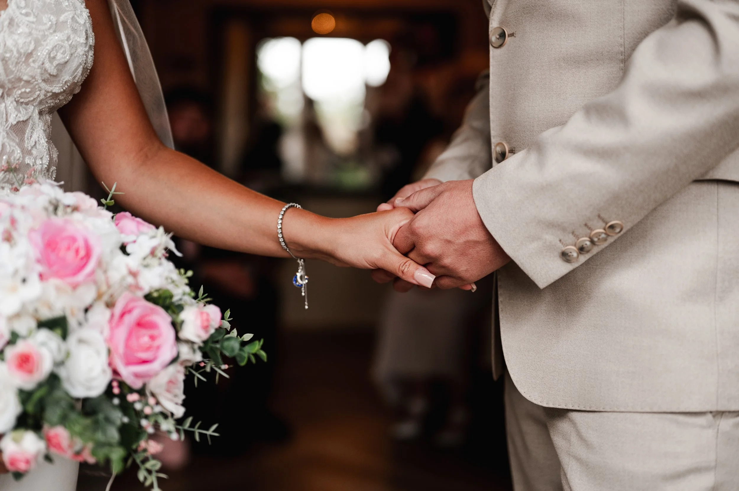 The Love Shack - Groom and bride's hand holding