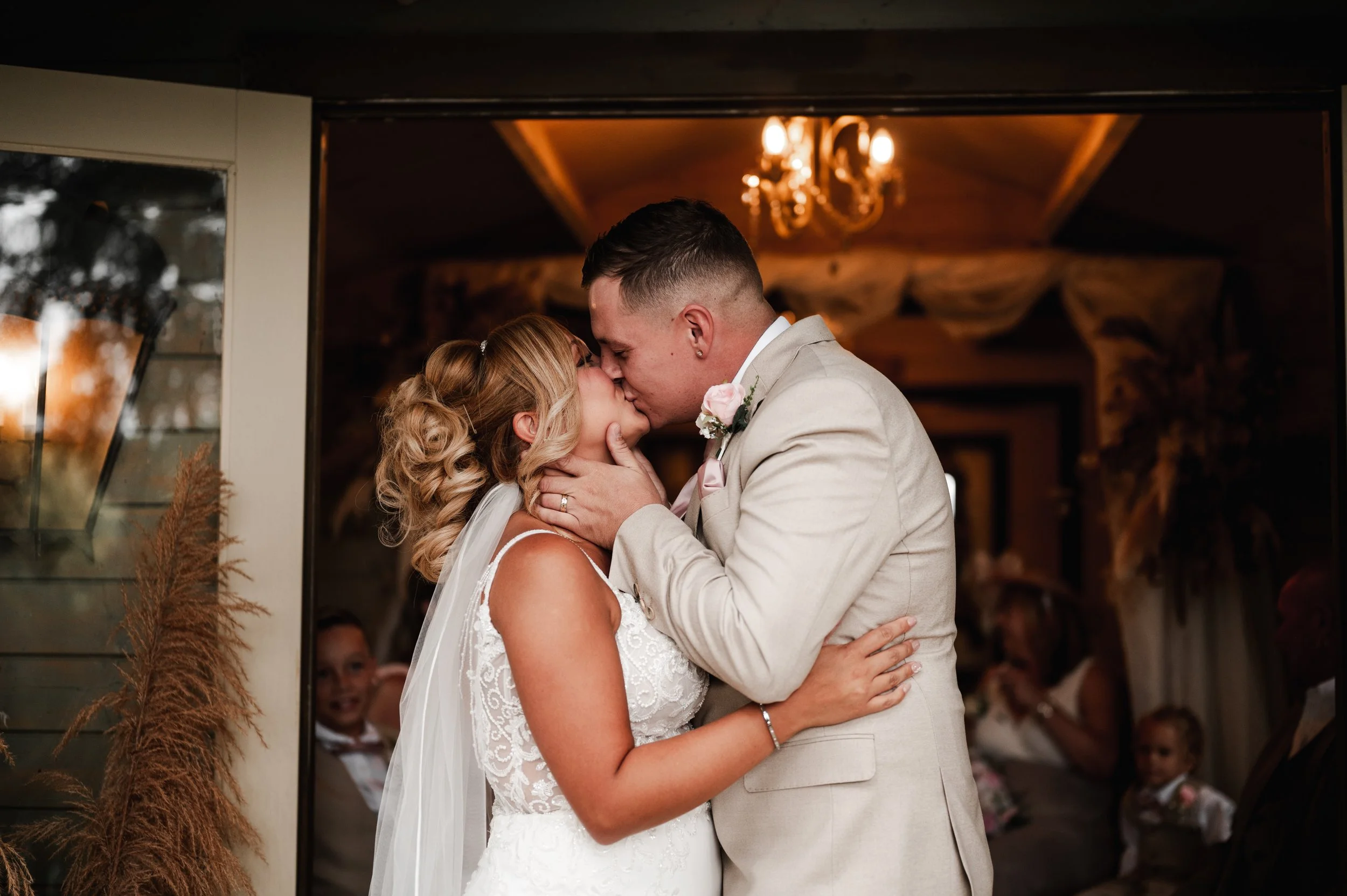 The Love Shack - groom and bride in wedding attire, kissing