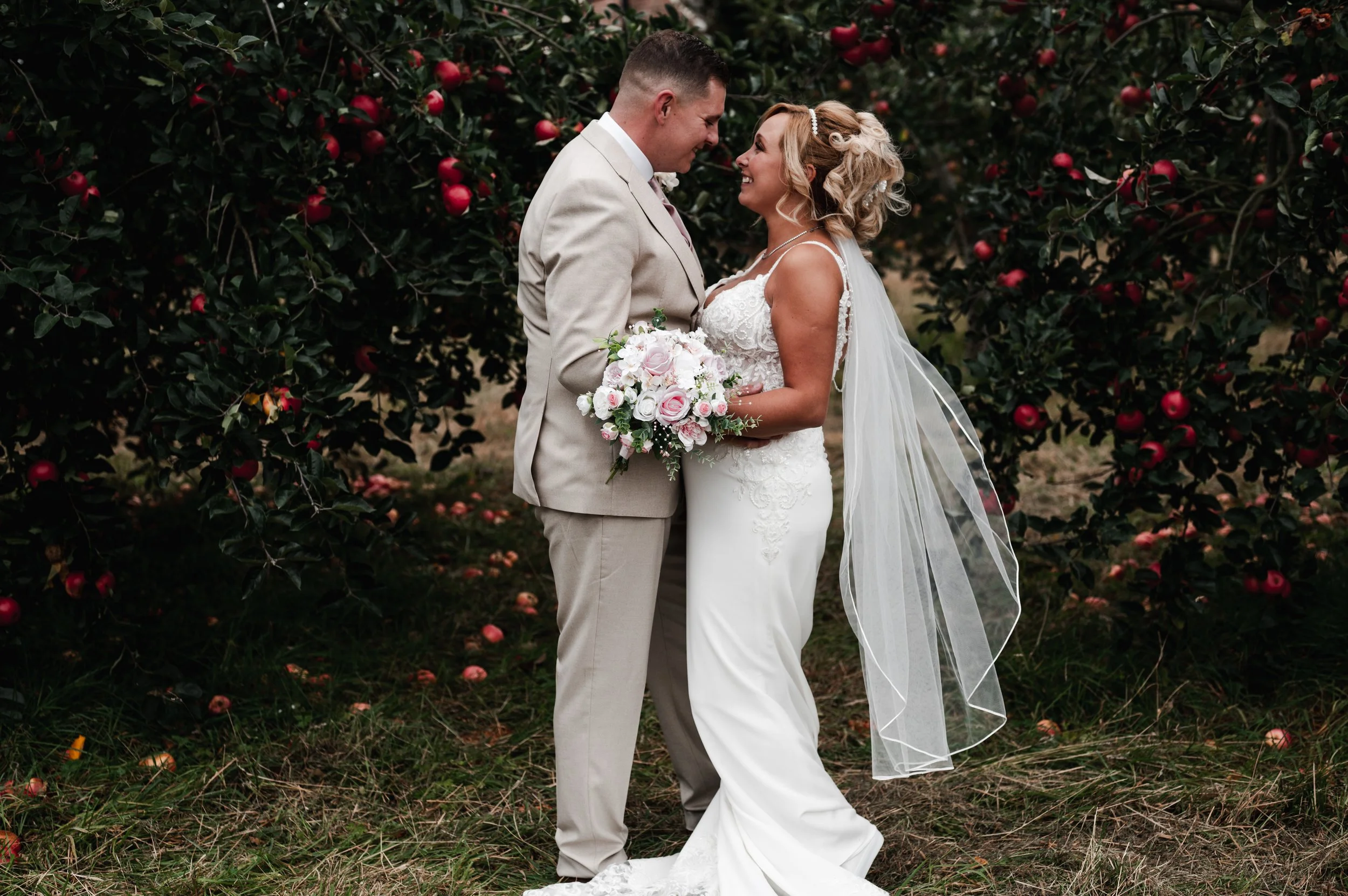 The Love Shack - Groom and bride in wedding attire, looking at each other
