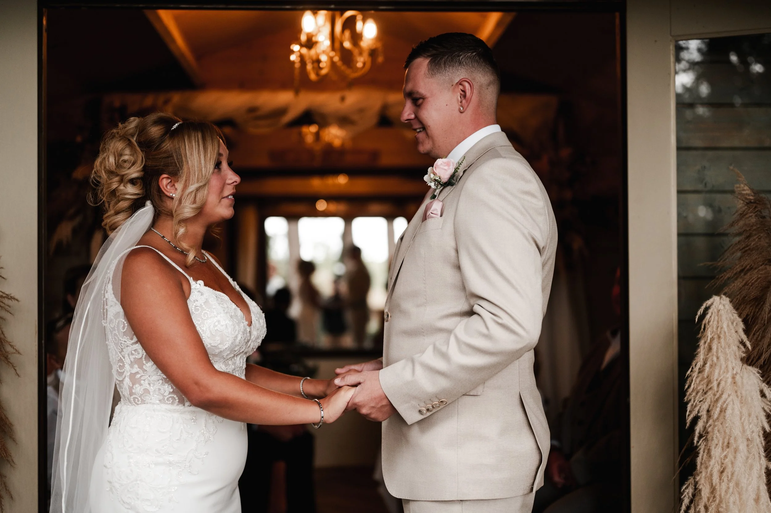 The Love Shack - Bride and groom in wedding attire during ceremony