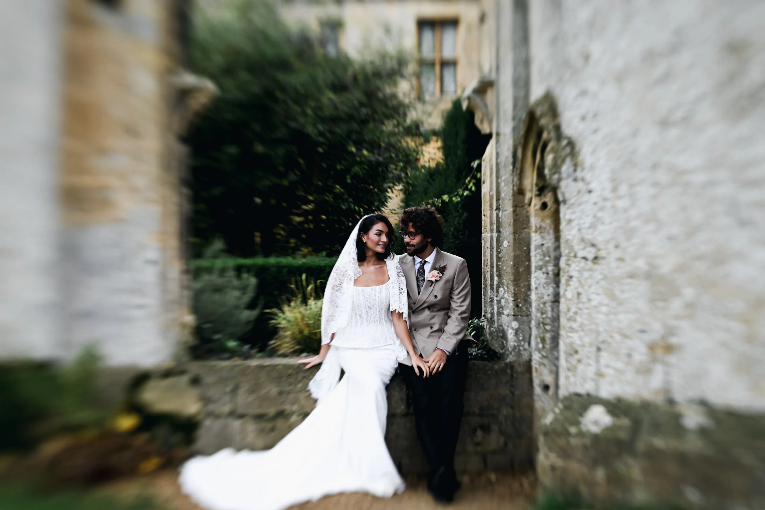 Sudeley Castle wedding photography – bride and groom kissing outdoors