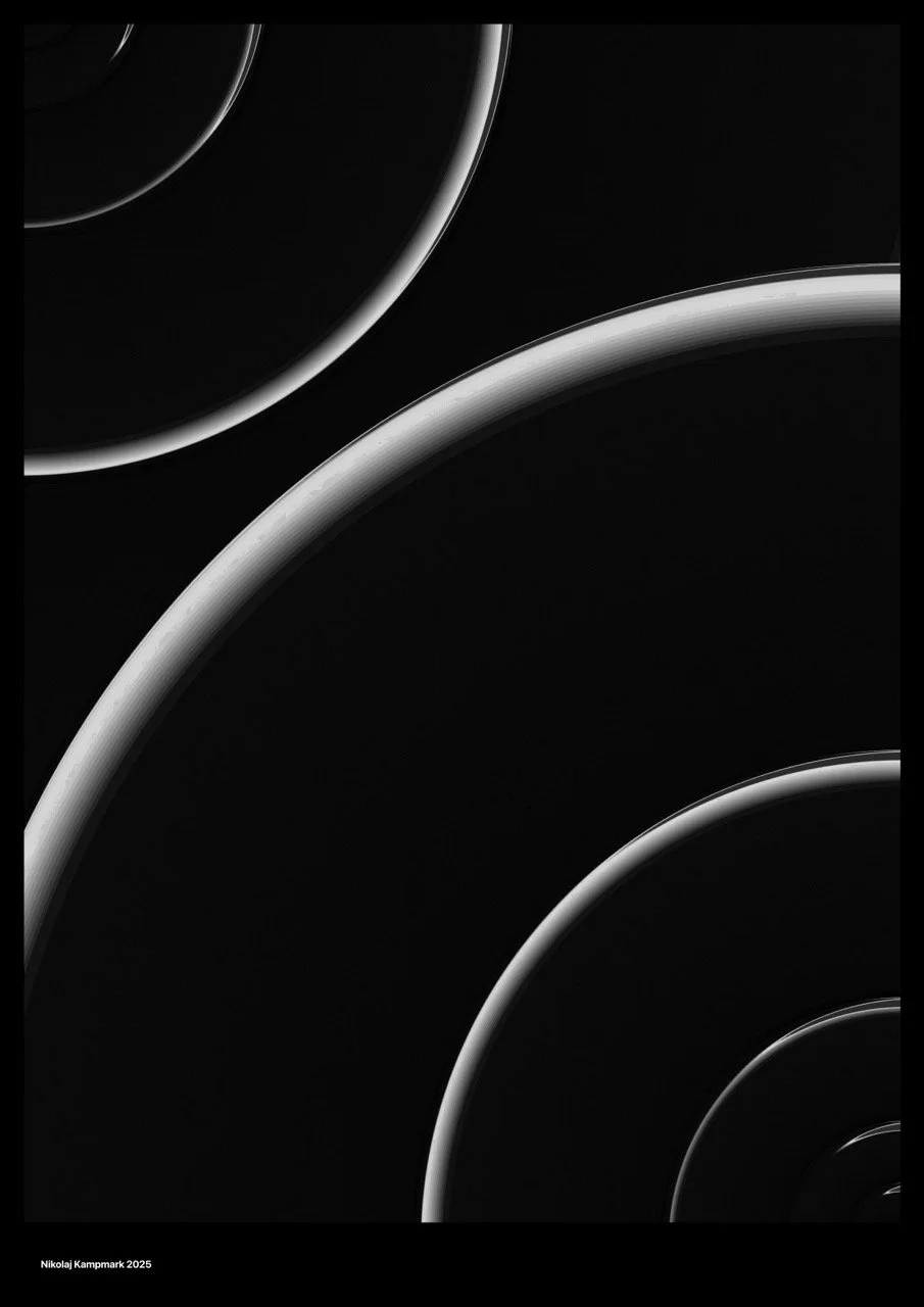 Black abstract background with concentric silver rings creating a modern, sleek design.