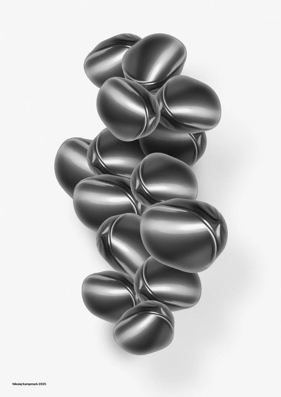 A collection of shiny black abstract shapes resembling smooth stones or organic blobs, arranged vertically against a plain white background.