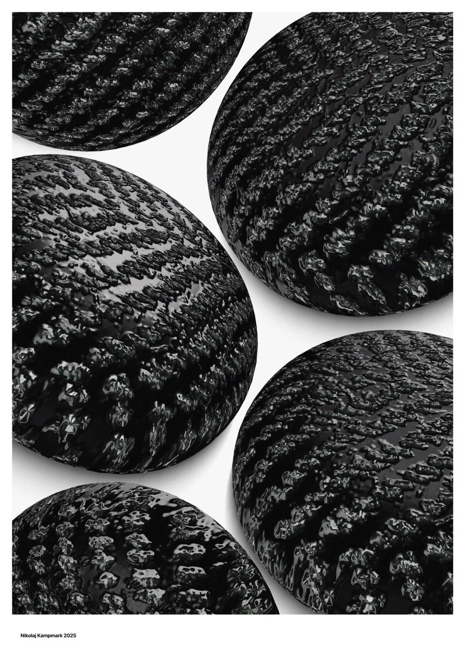 Close-up of five black, textured, rounded objects with a glossy finish on a white surface.