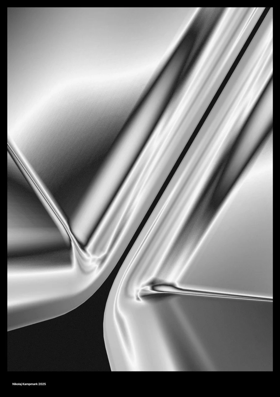 Close-up of brushed stainless steel metallic objects with smooth, reflective surfaces and detailed contours.