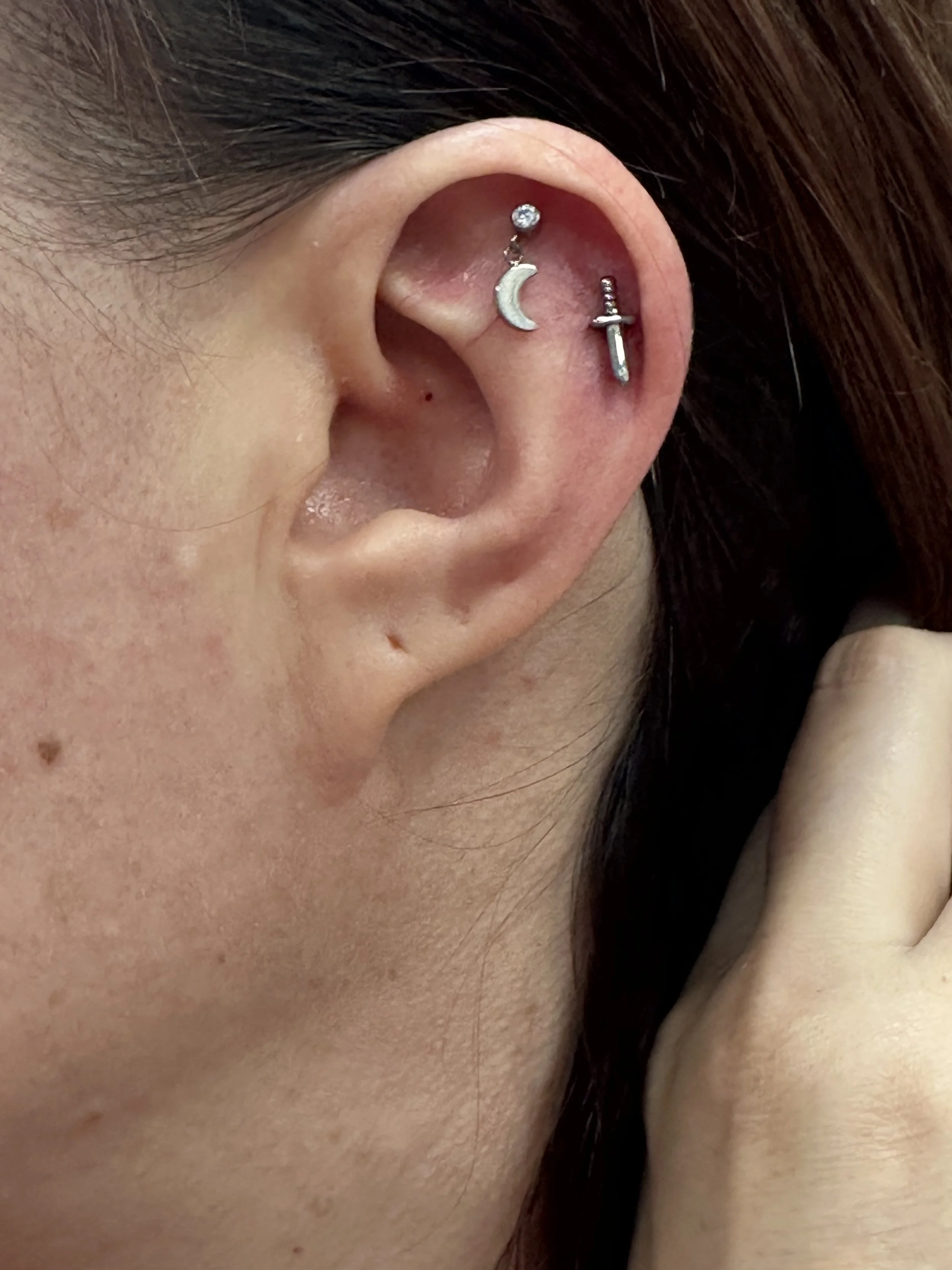 Dangling charms look fantastic in the flat and the helix. 