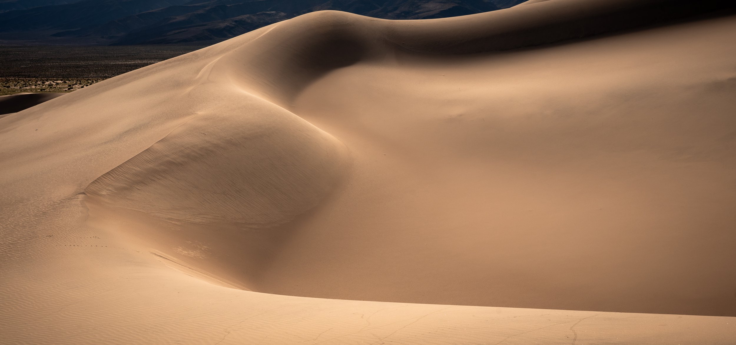 Abstract telephoto view of Death Valley sand dune