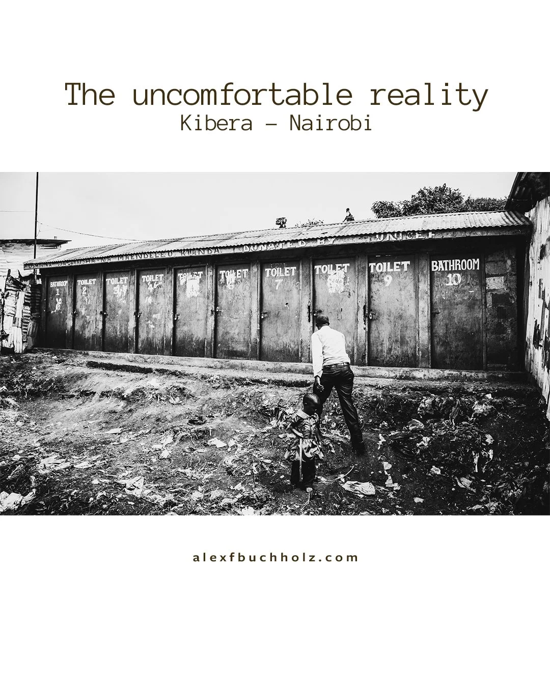 Black and white photo of a row of portable toilets labeled 'TOILET' and 'BATHROOM' in Kibera, Nairobi, with a man and a child walking in front of them.