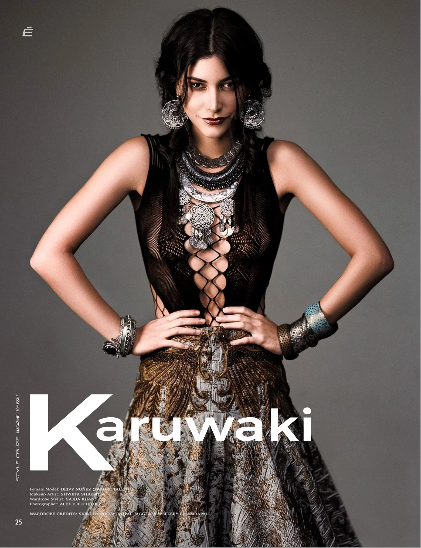 Fashion magazine cover featuring a woman in black mesh top with jewelry and a patterned skirt.