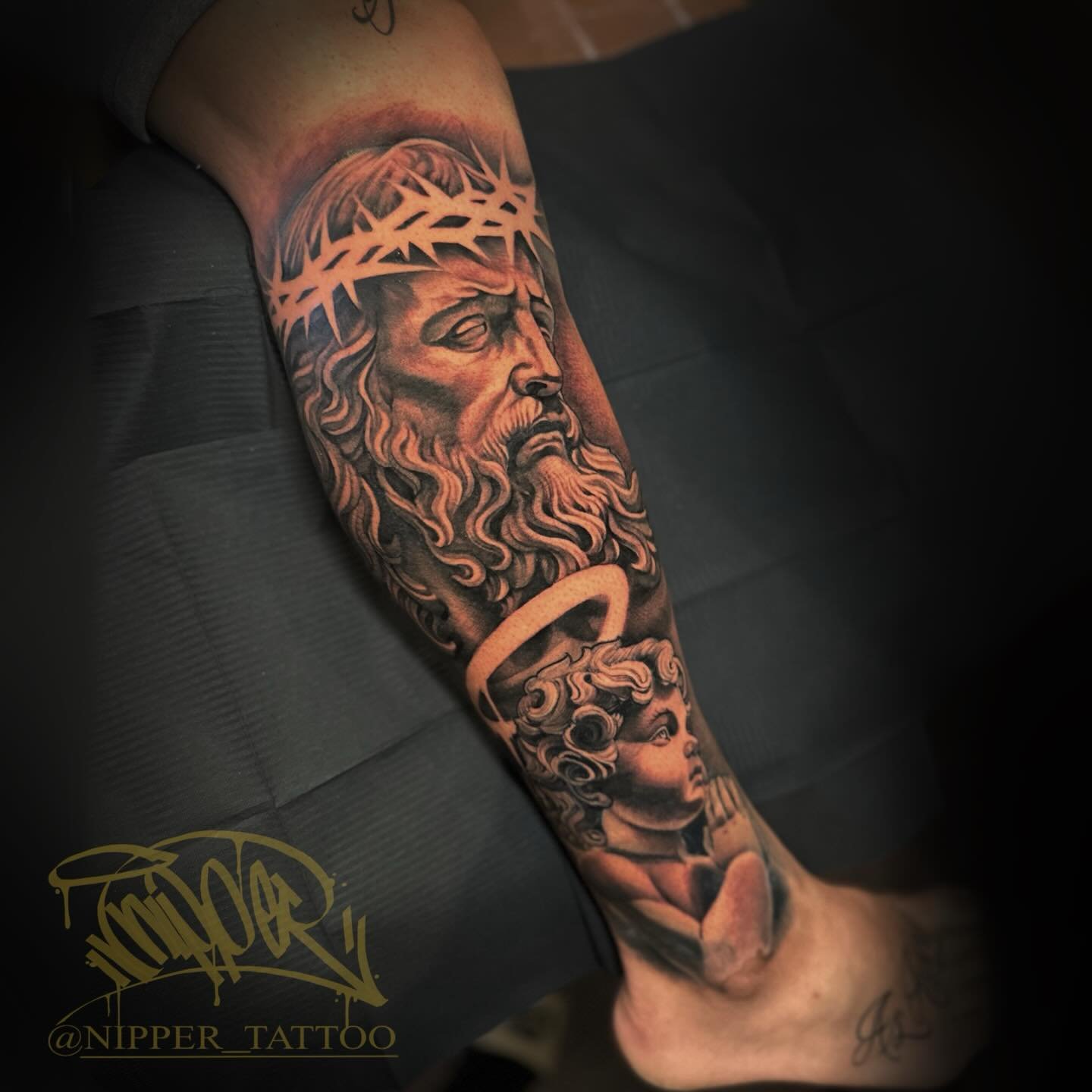#blackandgreytattoo #cherub #christtattoo
