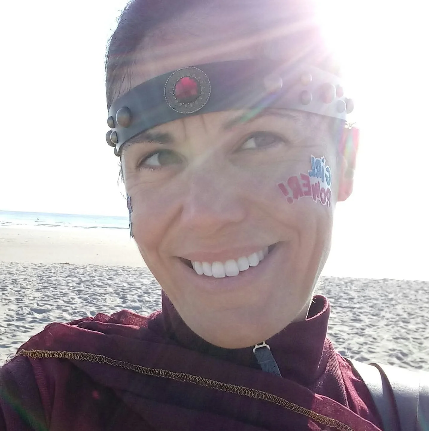 Woman dressed as Wonder Woman for road race