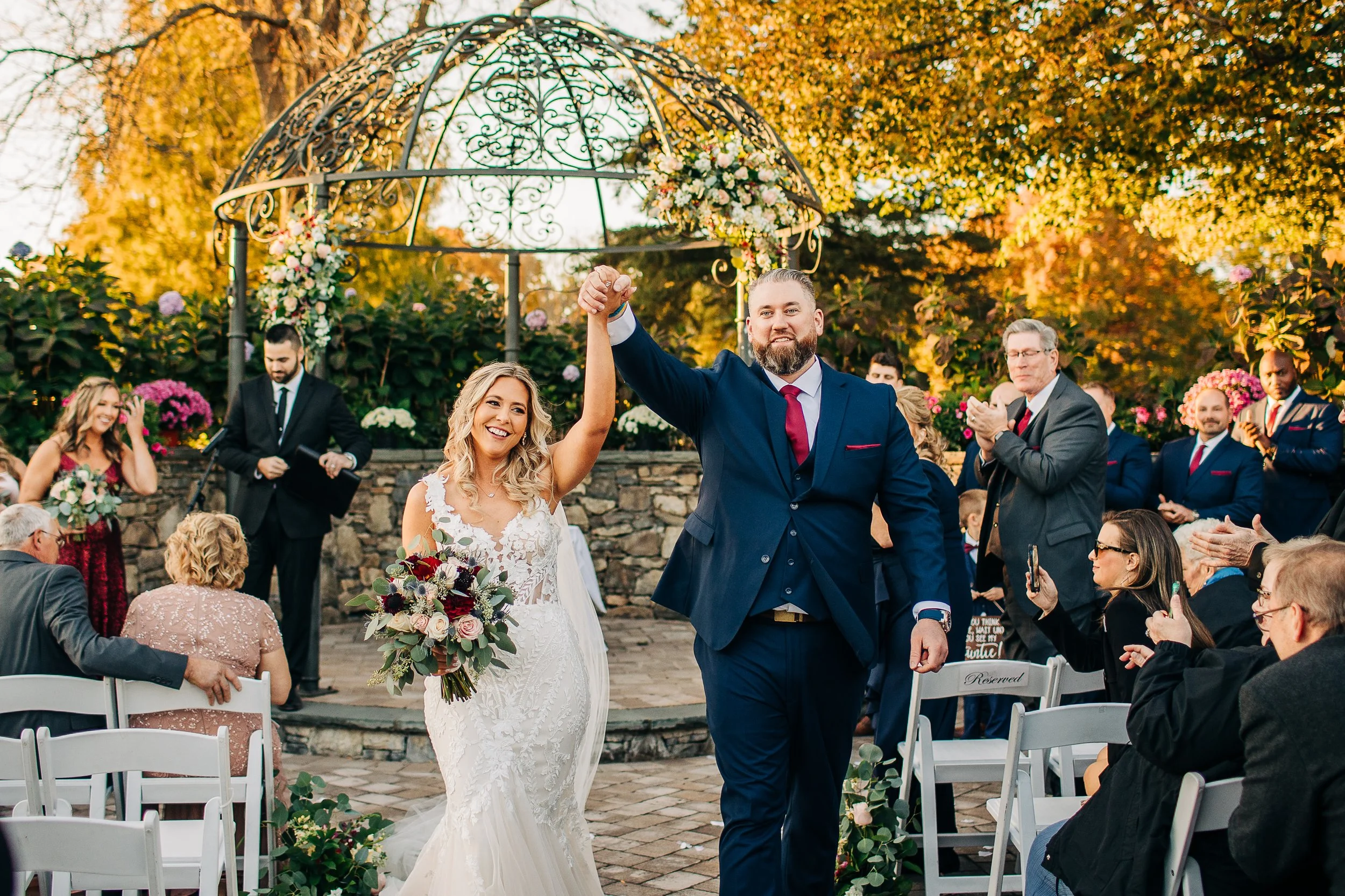 Outdoor wedding ceremony in autumn at West Hills Country Club