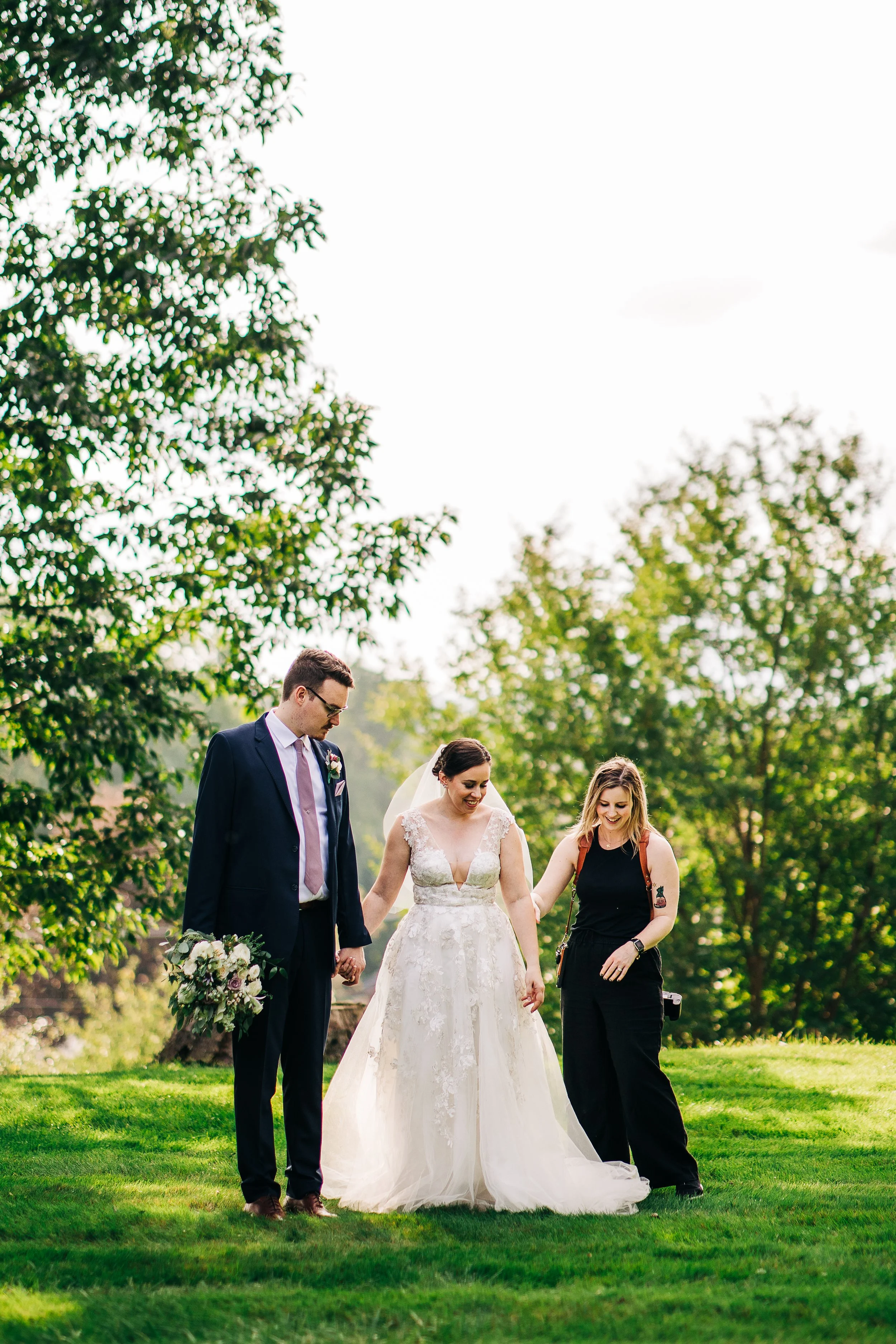 Catskills wedding photographer applying prepping bride and groom