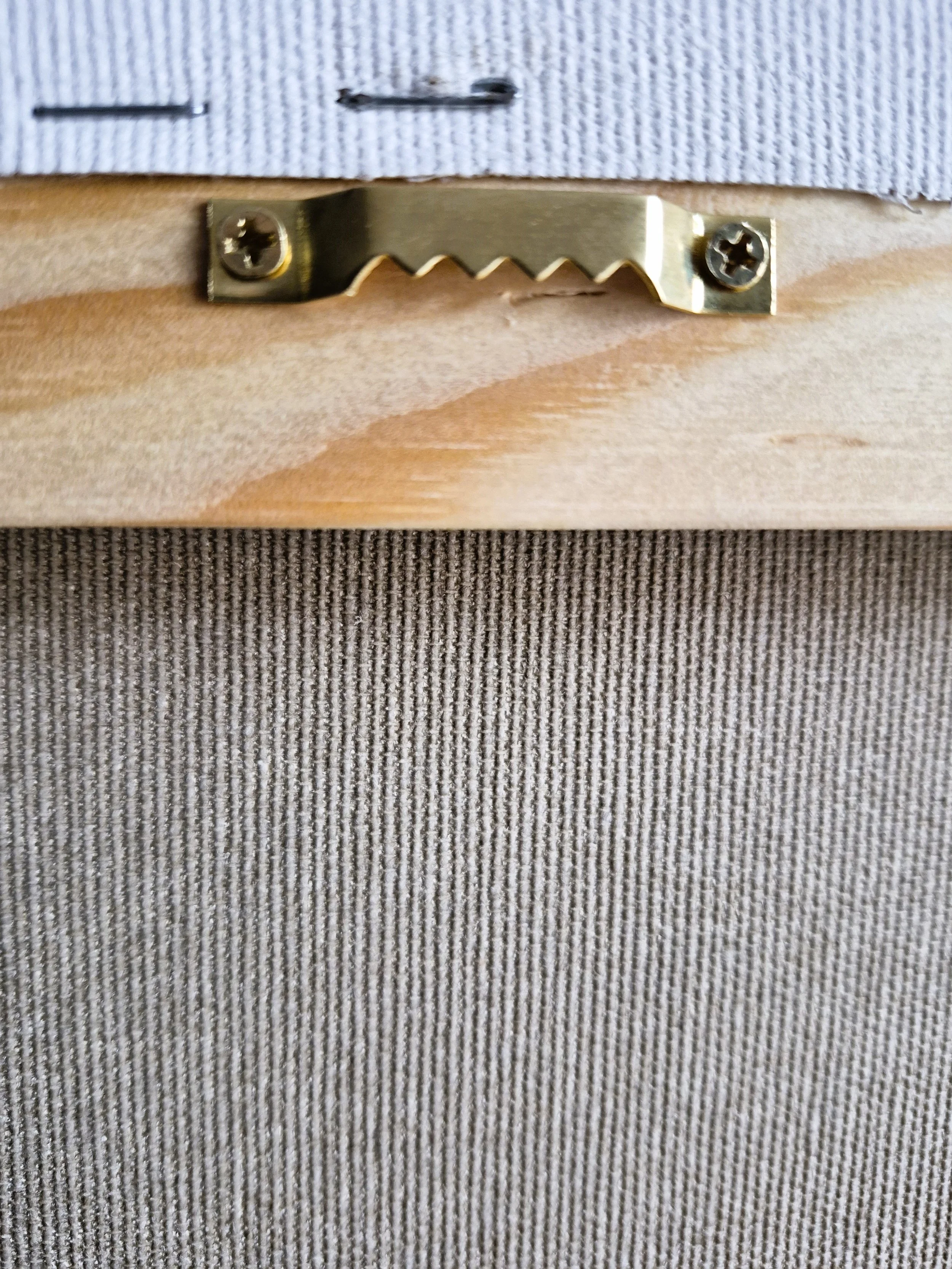 High-quality professional hanging system installed on the back of the artwork for immediate display