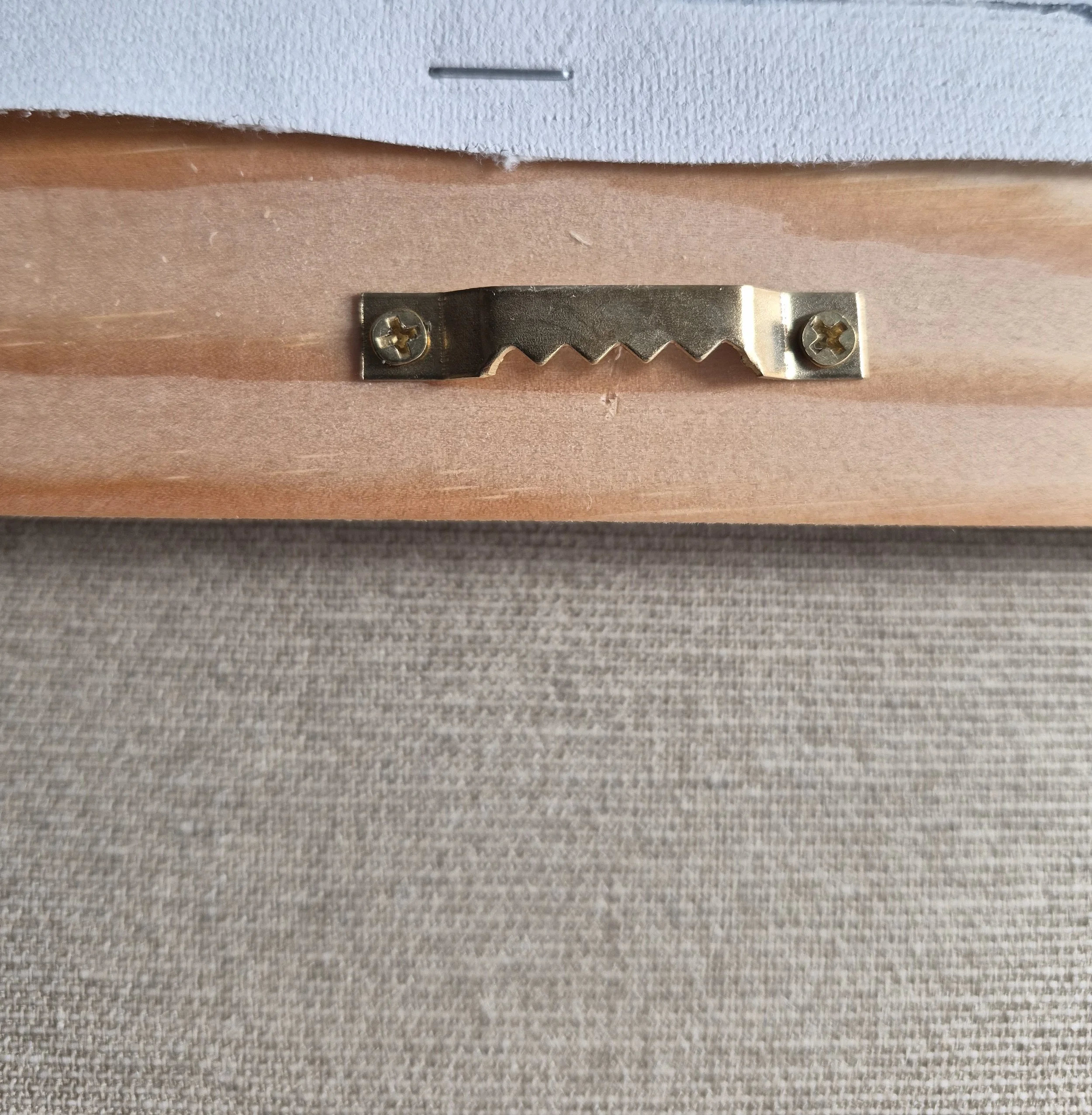 High-quality professional hanging system installed on the back of the artwork for immediate display