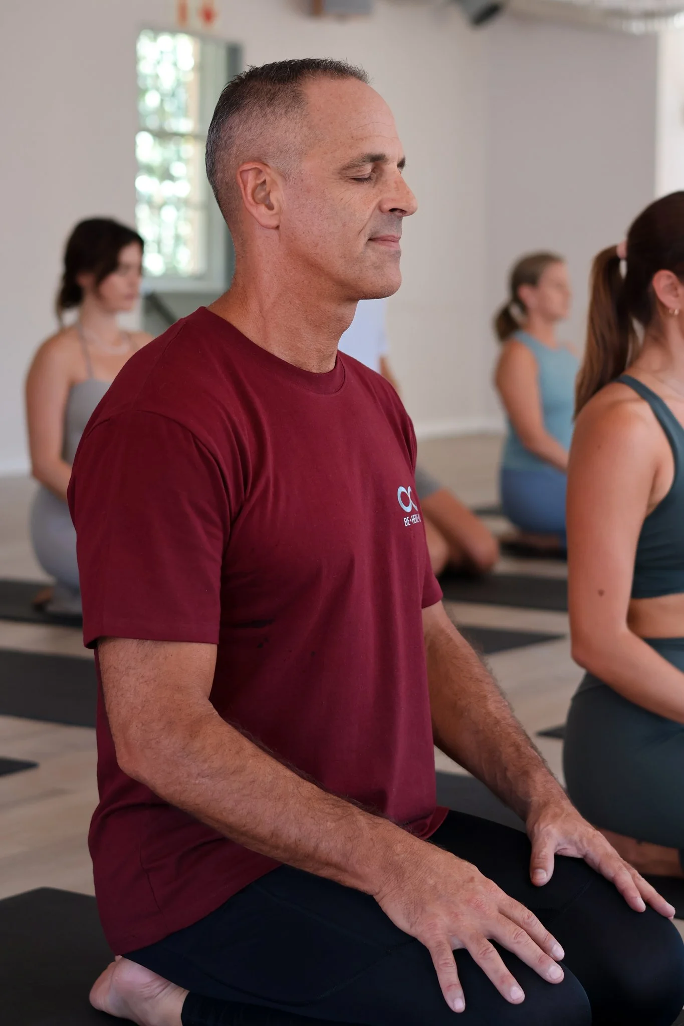 man and women doing yoga in Cape Town best yoga studio