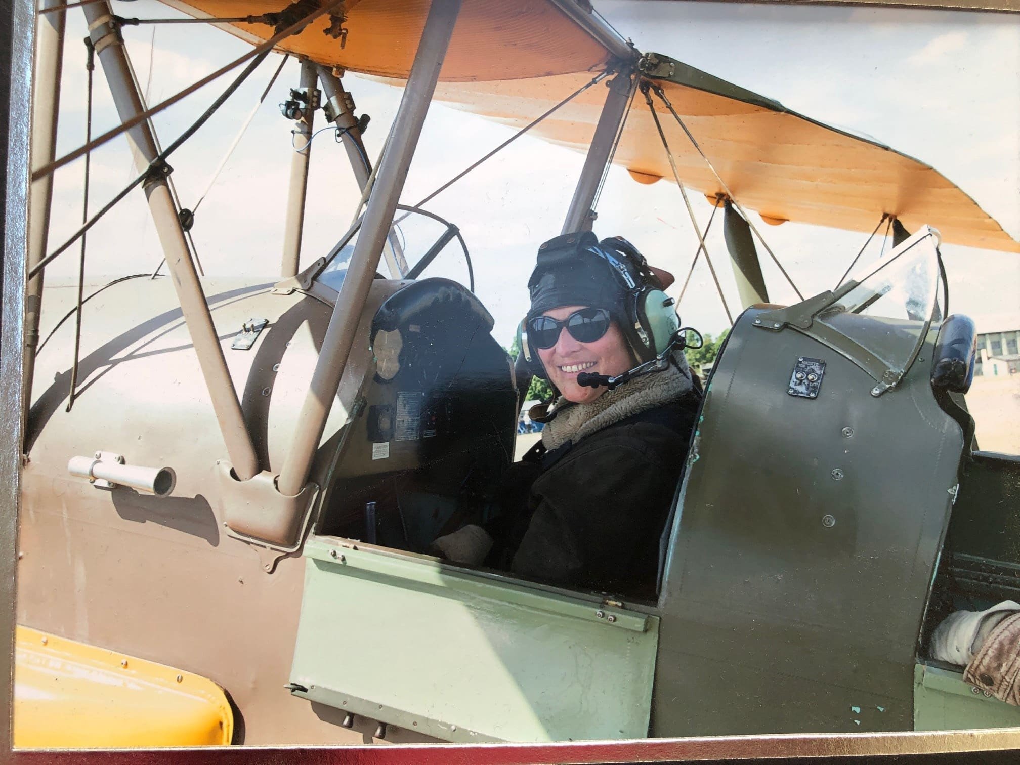 Mari Williams in a bi-plane at the Imperial War Museum Duxford