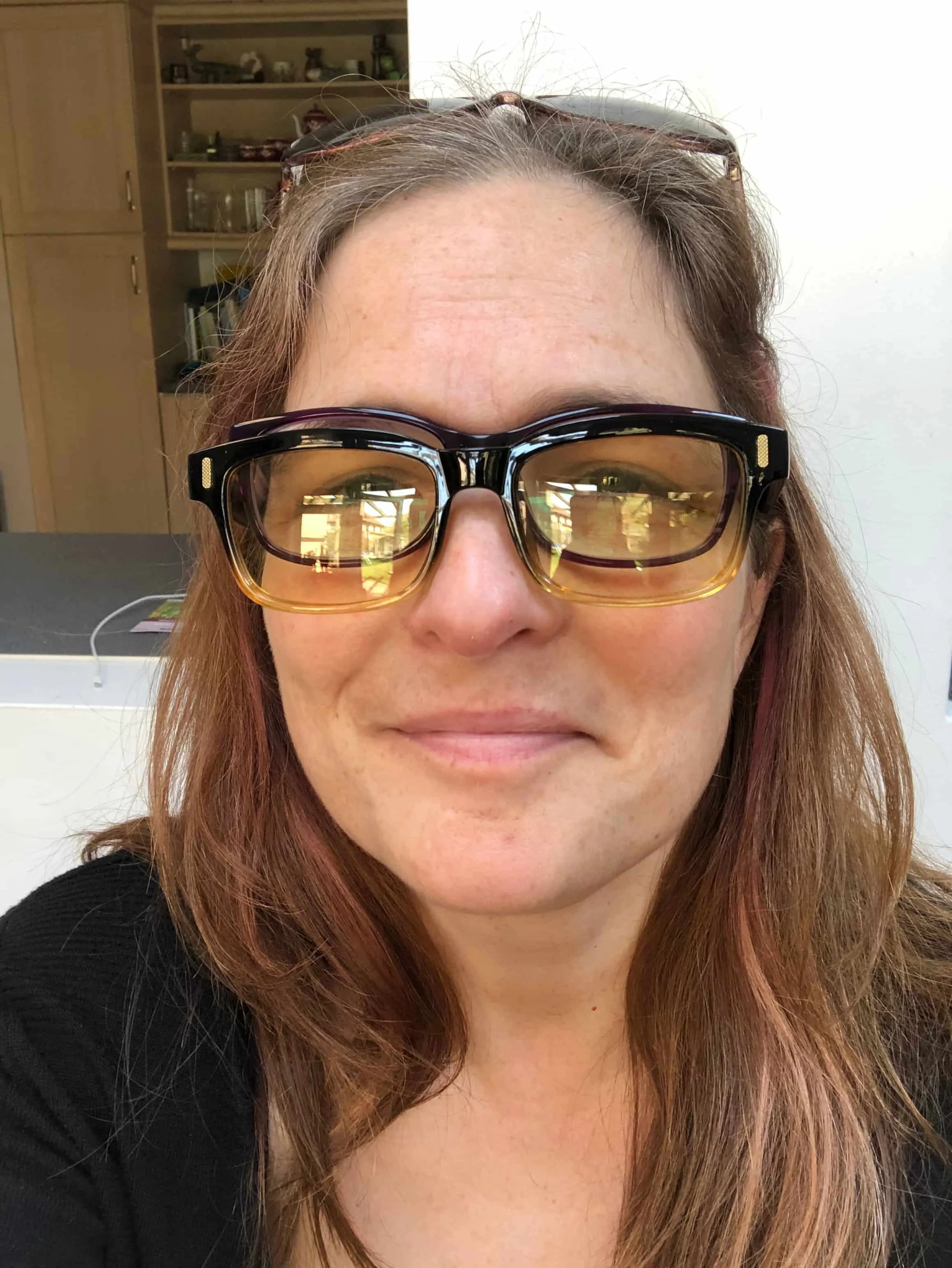 Mari Williams wearing two pairs of glasses during working from home, covid 19