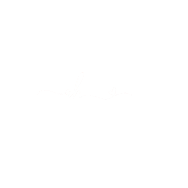 Black background with white circular brush stroke, the words "Lah" in cursive, and "Annette Hébert" in uppercase below.