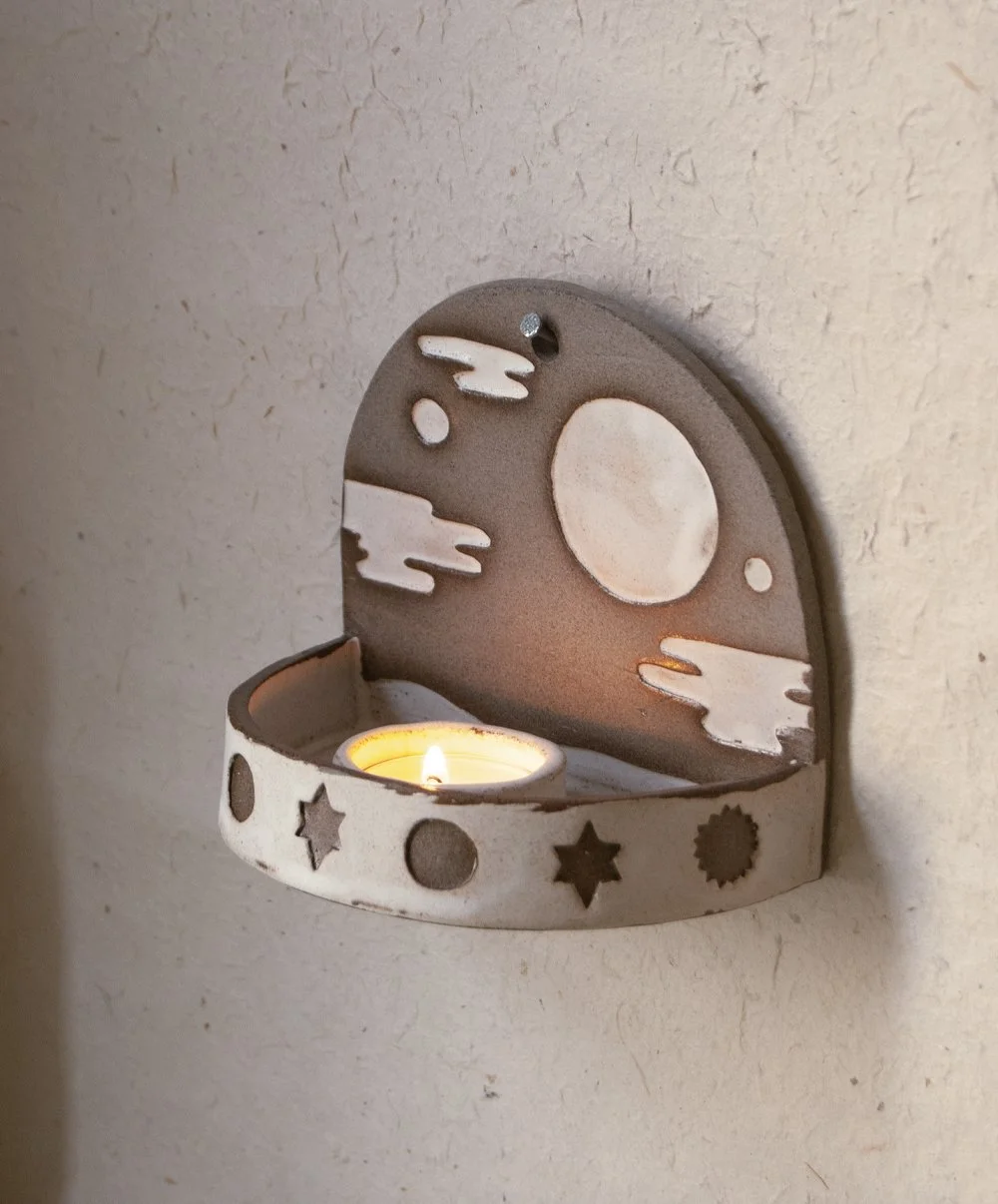 Grey stoneware candle sconce