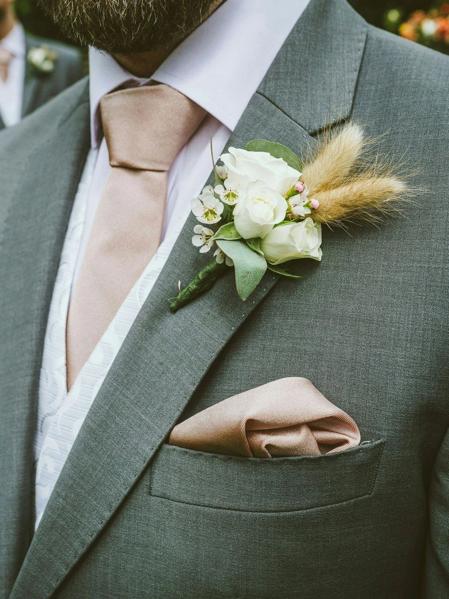 Buttonholes - small in size, powerful in detail. 

Thoughtfully designed to echo the bridal bouquet and wider floral story, each one is considered, textural, and never an afterthought.  Proof that the smallest details matter.

Photo - @lavenhamphoto 
