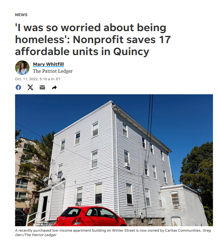 White low-income apartment building on Winter Street with a red car parked in front, under a clear blue sky.