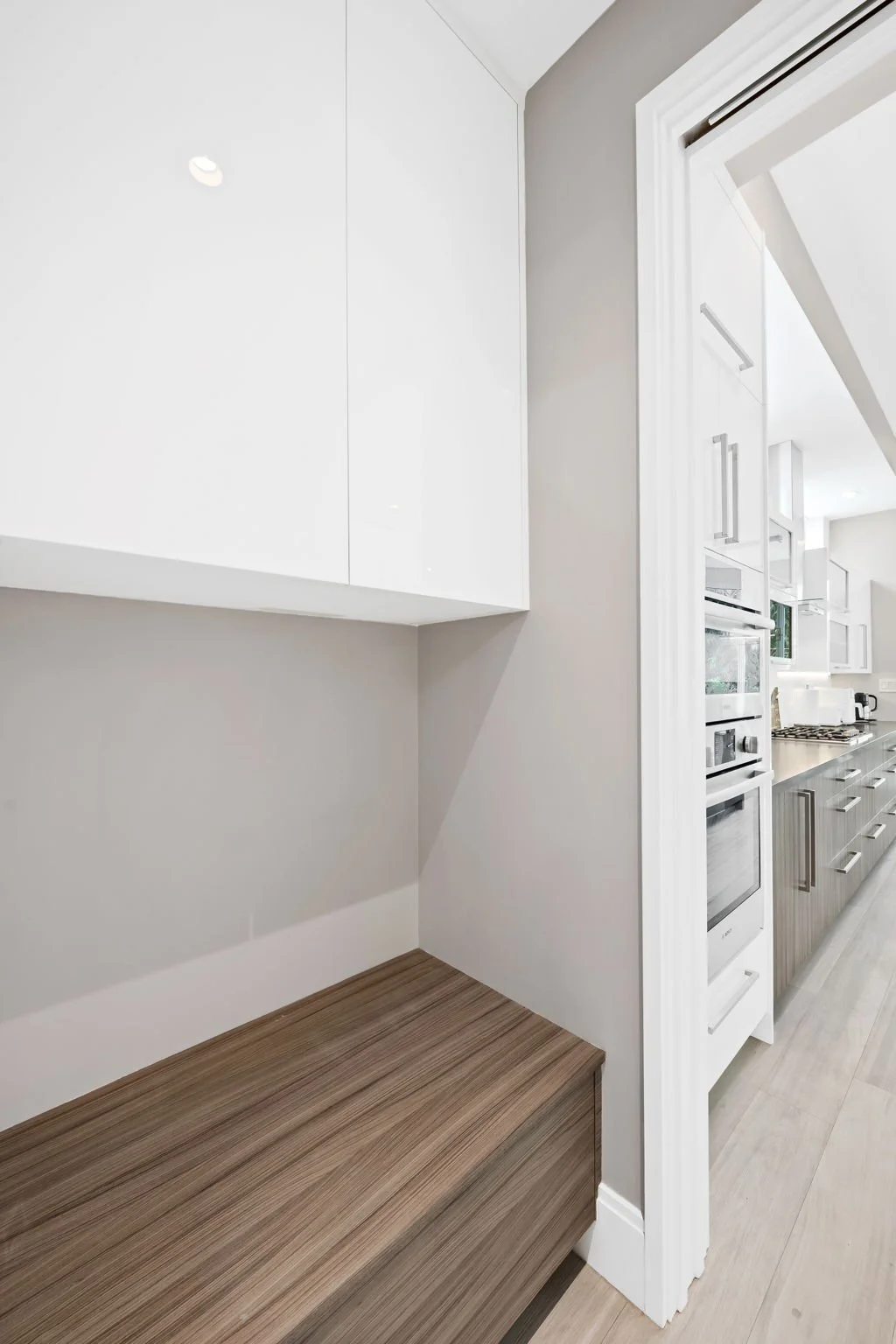 Modern kitchen with built-in oven and natural light — Sun Haven Collection luxury vacation rental.