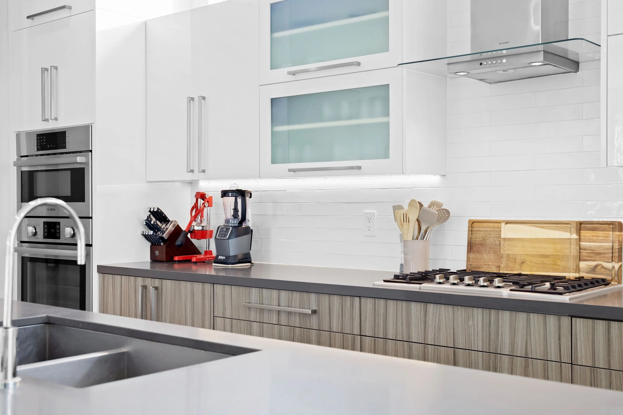 Stocked gourmet kitchen with premium tools and appliances — luxury vacation home, Sun Haven Collection.