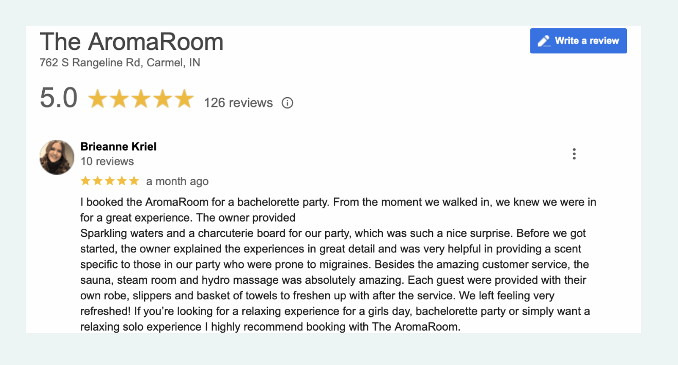 Screenshot of a Google reviews page for The AromaRoom, a spa in Carmel, Indiana, showing five-star rating, review count, and a positive review from a customer praising the services and experience.