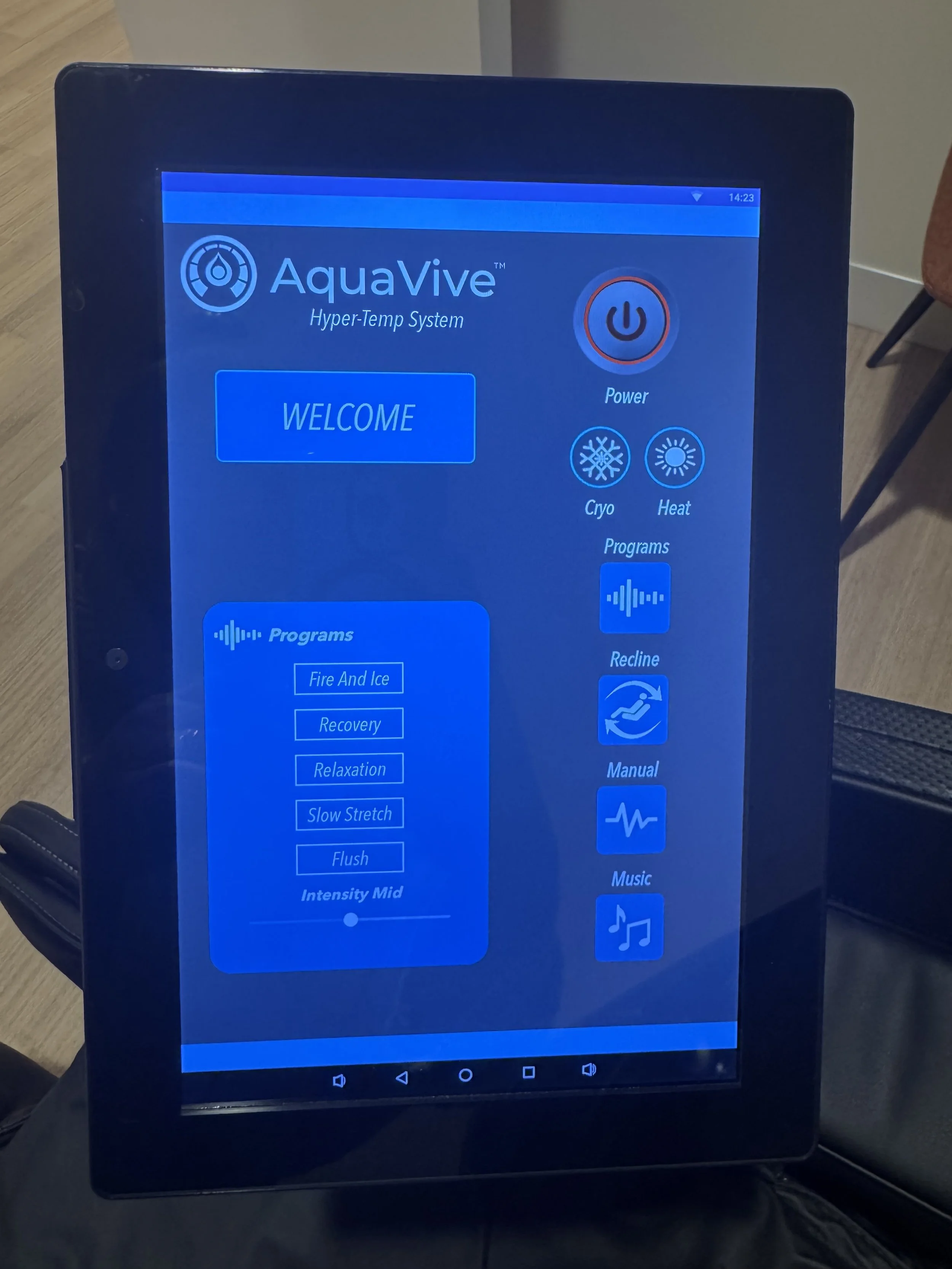 Touchscreen control panel for AquaVive Hyper-Temp System displaying programs such as Fire and Ice, Recovery, Relaxation, Slow Stretch, and Flush.