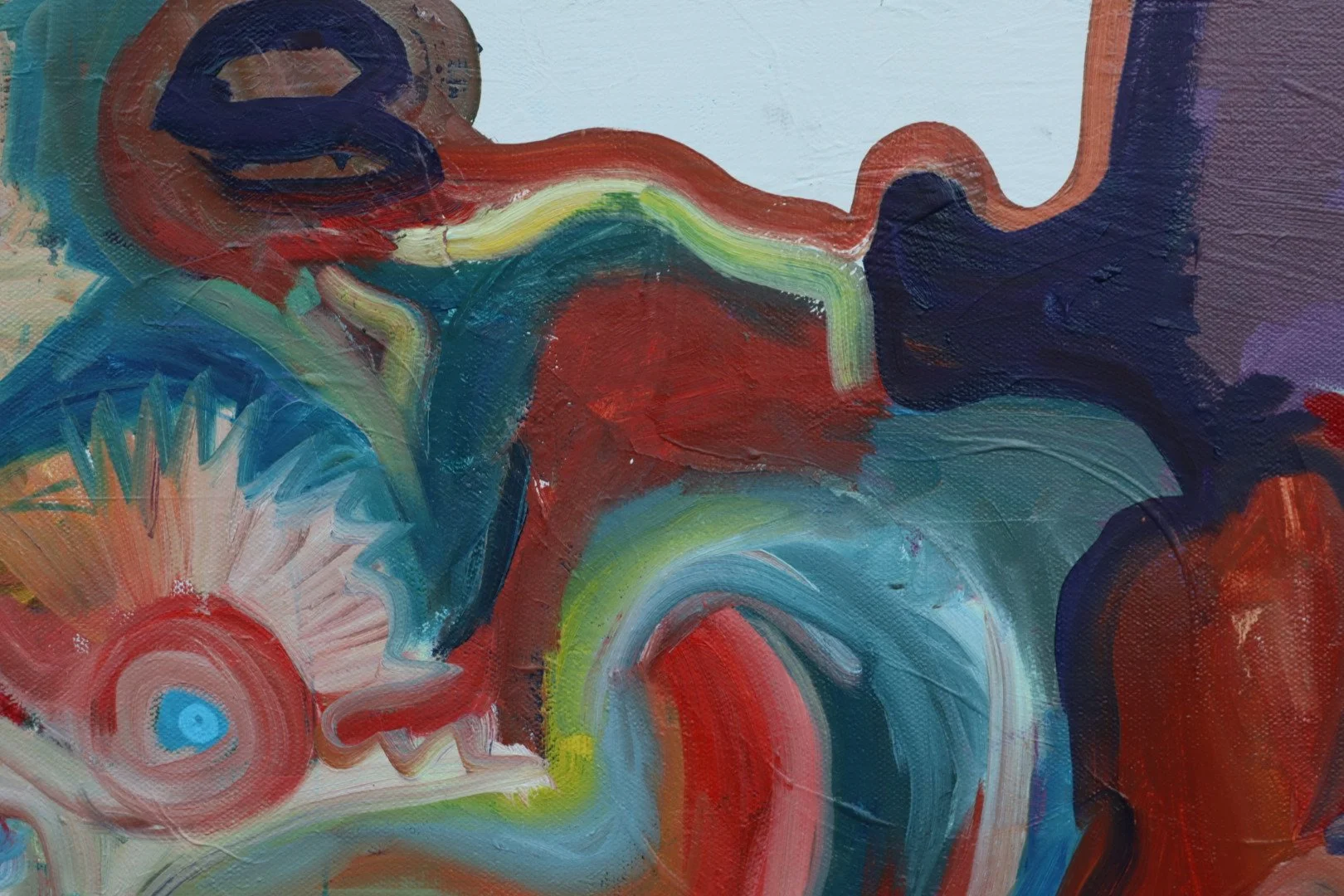 Close-up of an abstract painting with swirling shapes and bold, vibrant colors including red, blue, yellow, green, and purple.