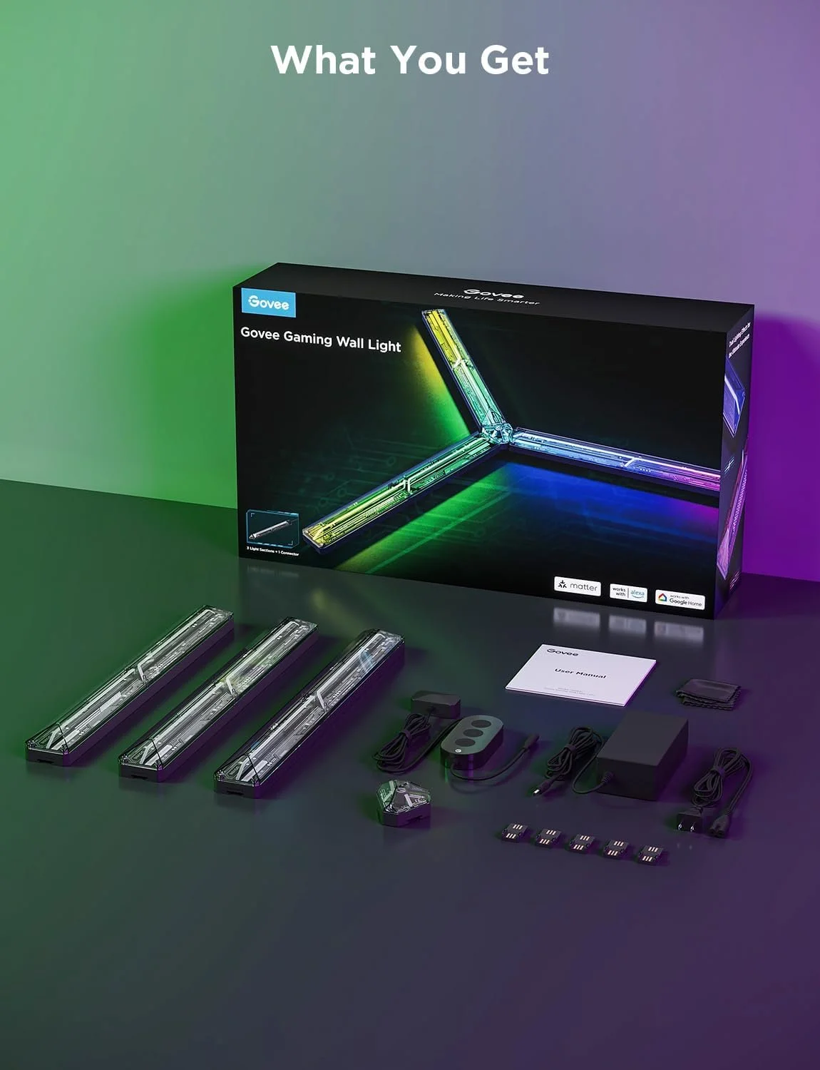 Govee Gaming Wall Light kit with four LED light bars, accessories, user manual, and remote, displayed on a table with a box in the background.