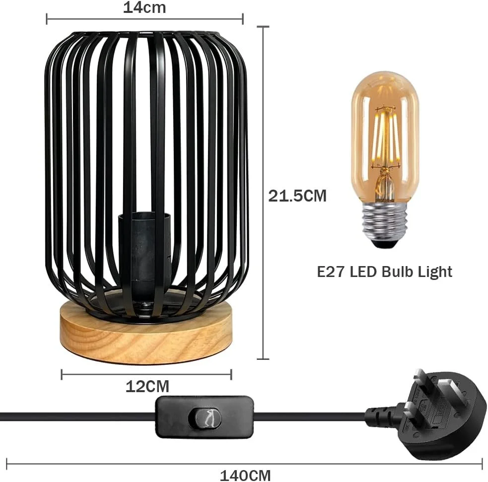 A black lamp with a wooden base and vertically aligned black slats. Dimensions are 14 cm wide, 12 cm deep, and 21.5 cm tall. Next to it is a vintage-style E27 LED filament bulb. A black electrical cord with a switch is also shown, measuring 140 cm lo