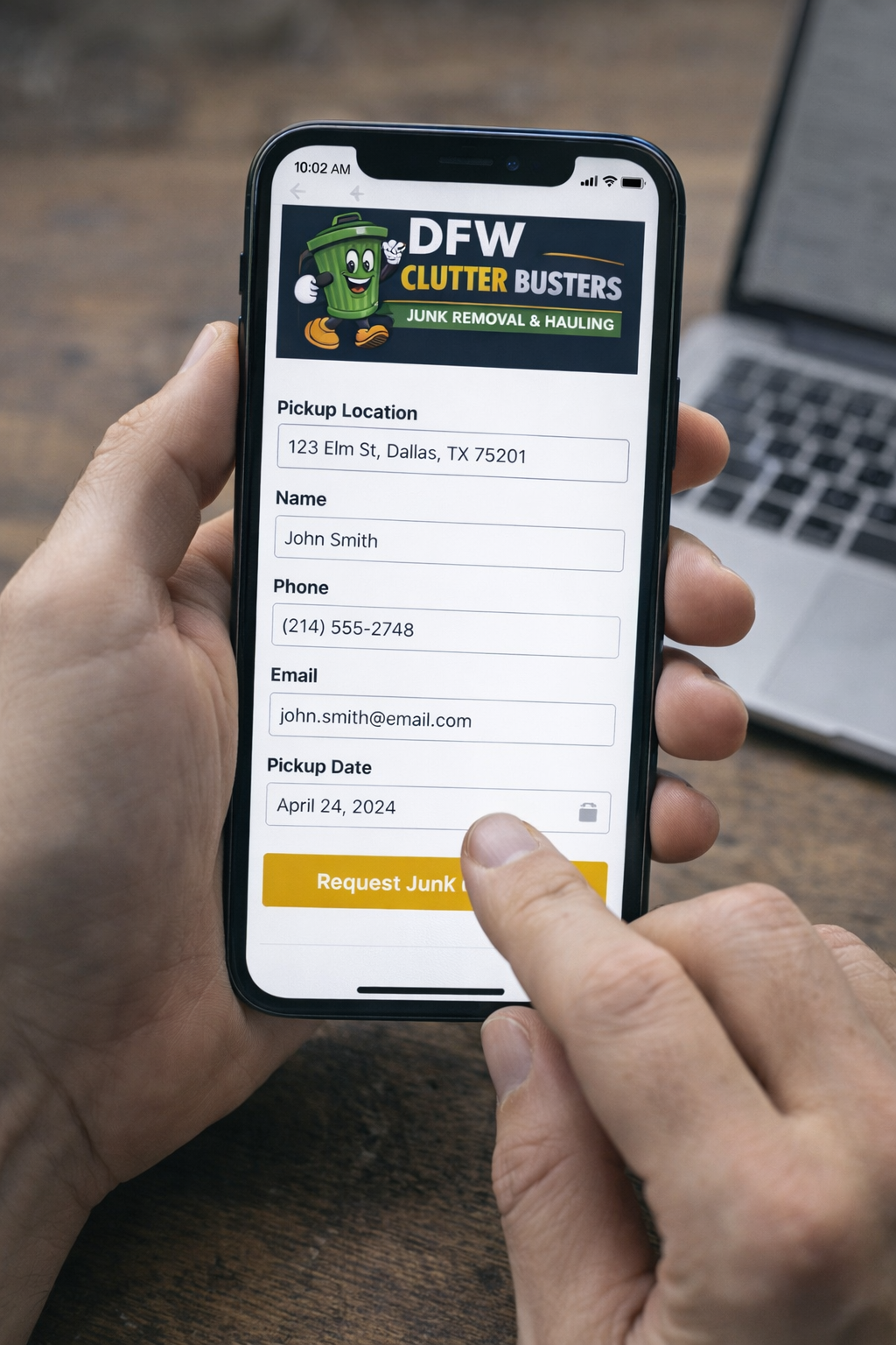 Mobile phone screen showing a form for junk removal service 'DFW Clutter Busters' with fields for pickup location, name, phone, email, and pickup date, and a yellow button labeled 'Request Junk'.