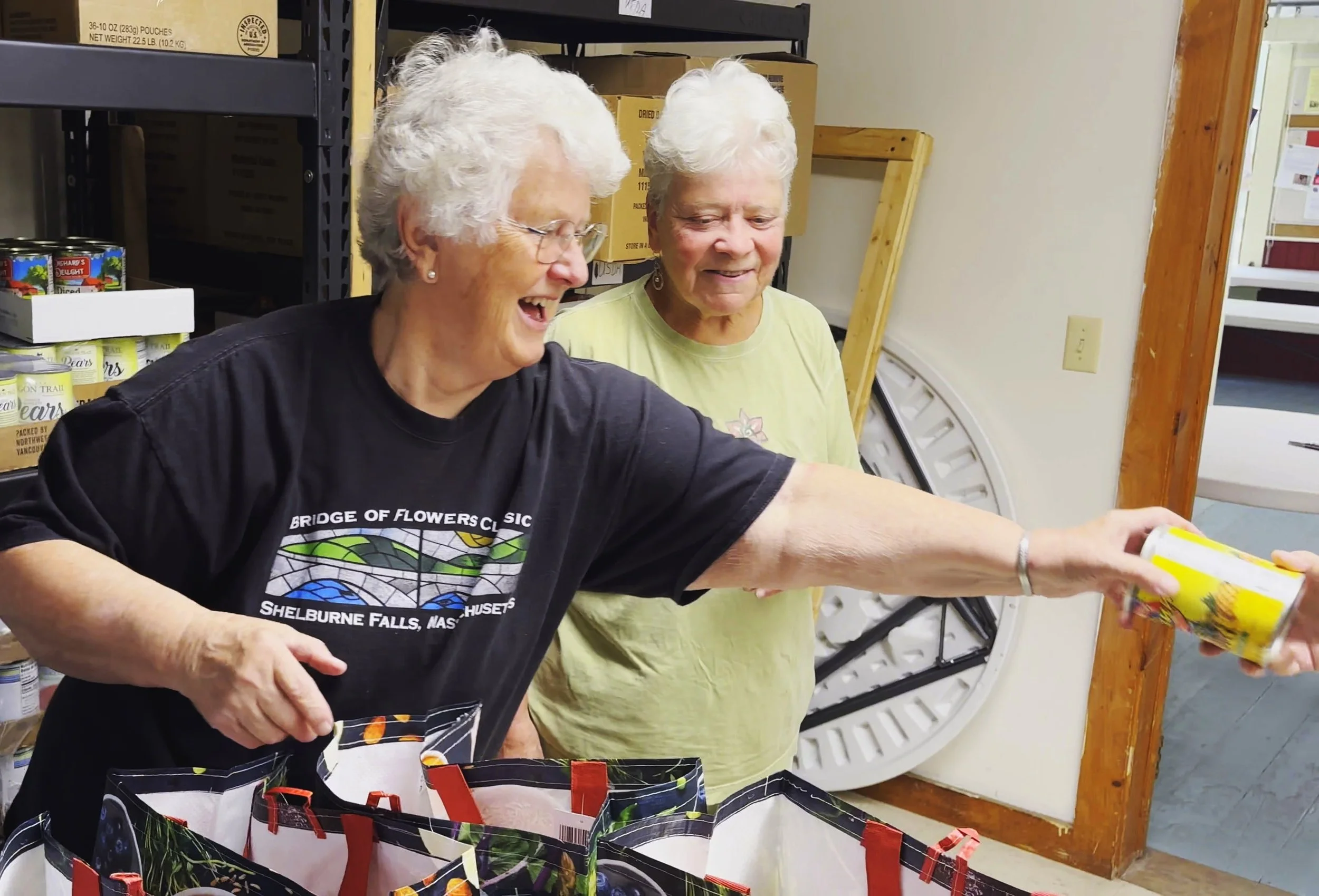 Handing out food at a food bank.