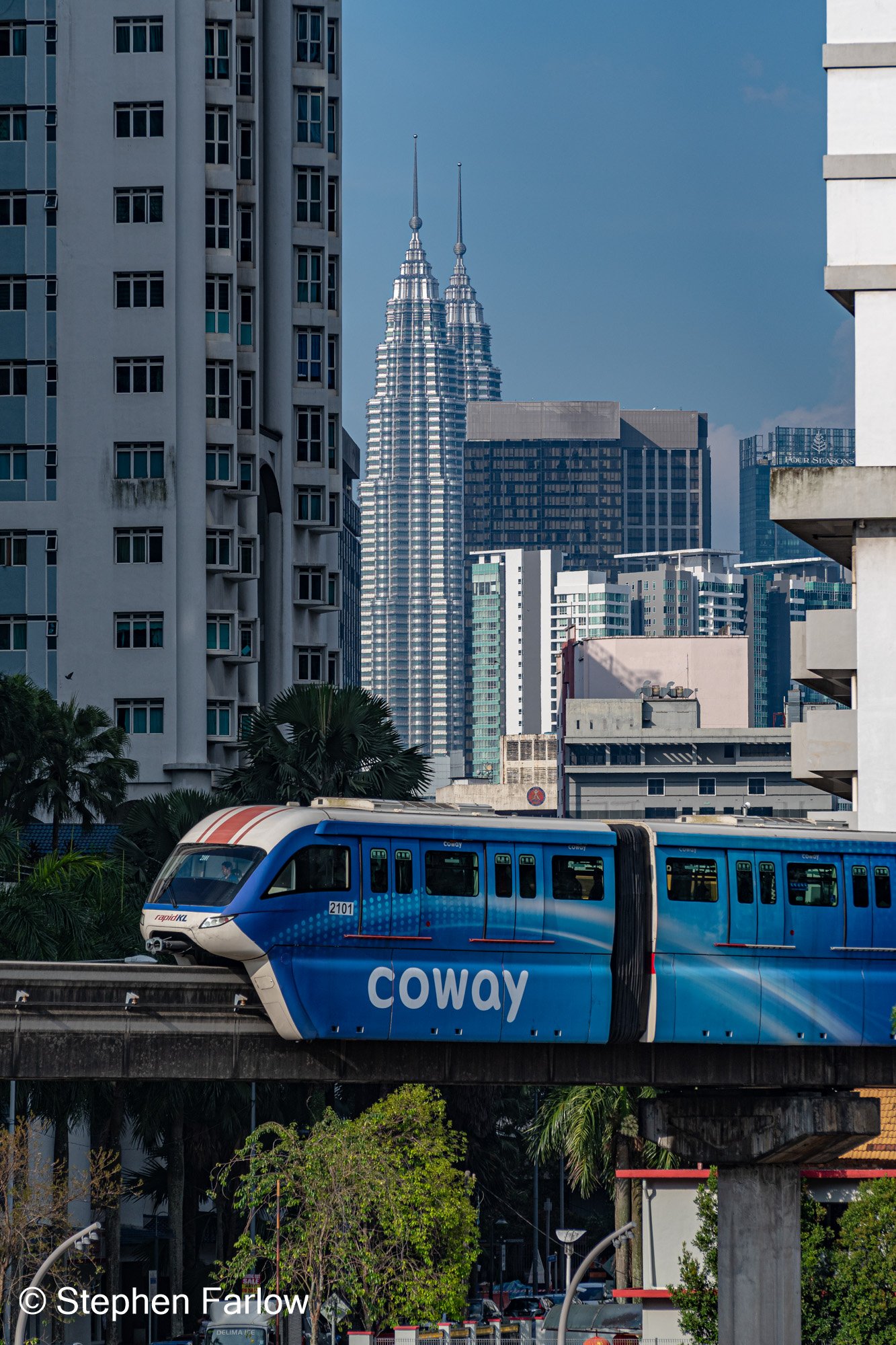 Petronas Twin Towers with a monorail train