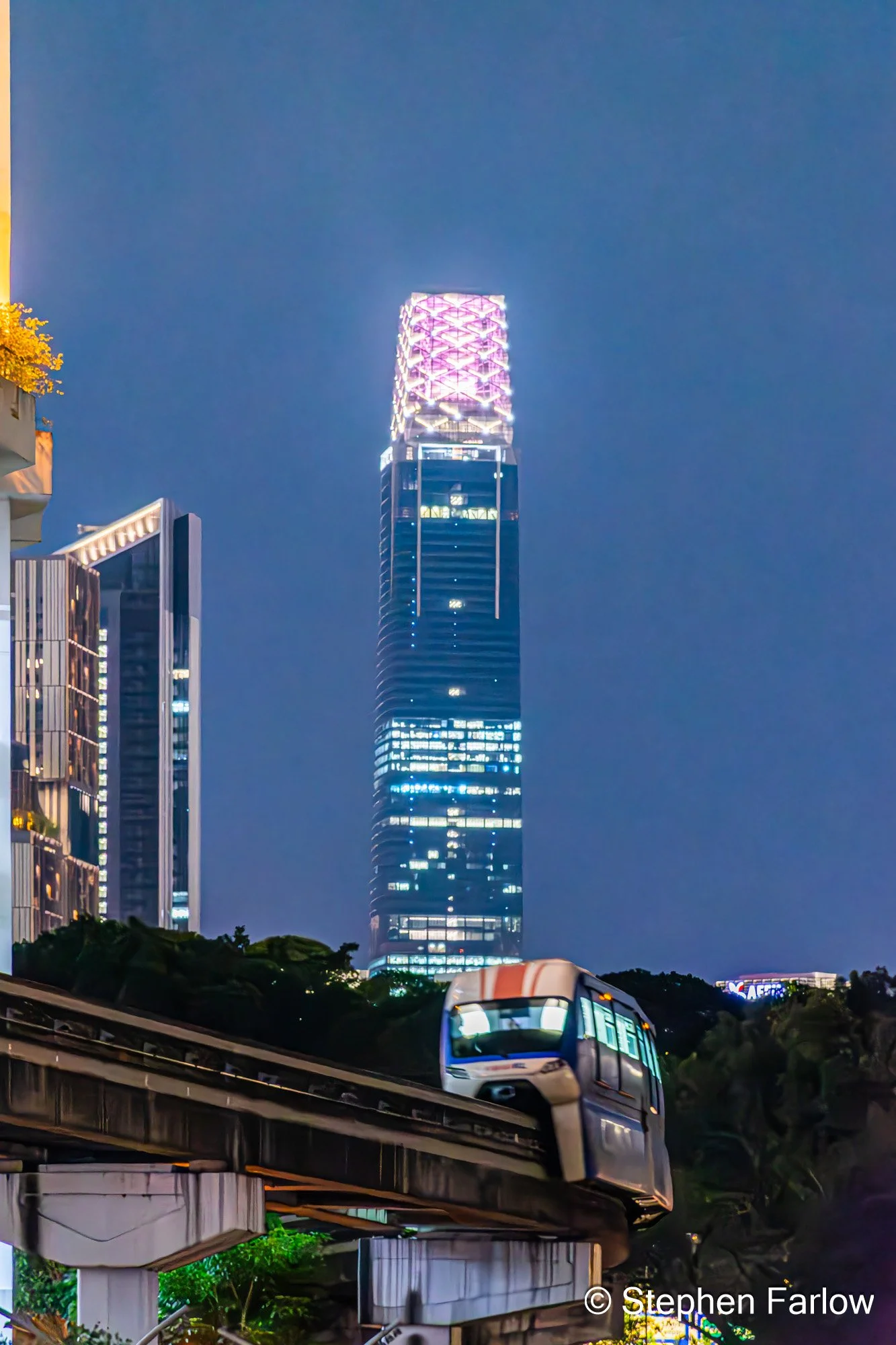 Exchange 106 at TRX with monorail train