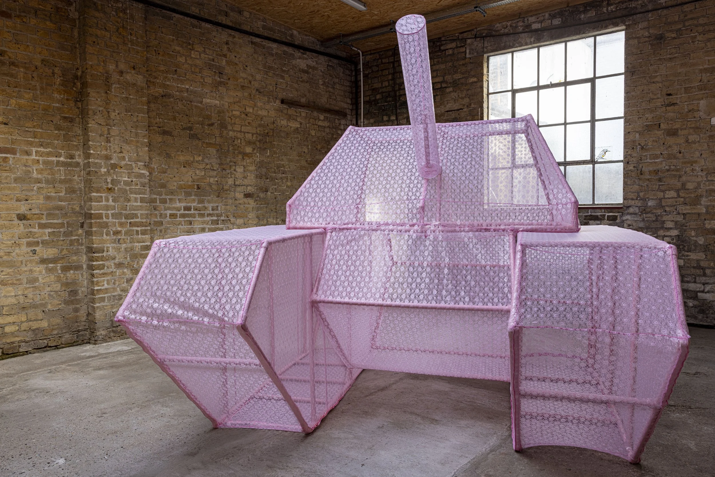 An image of Power Play from a front facing angle, situated in an industrial warehouse setting.