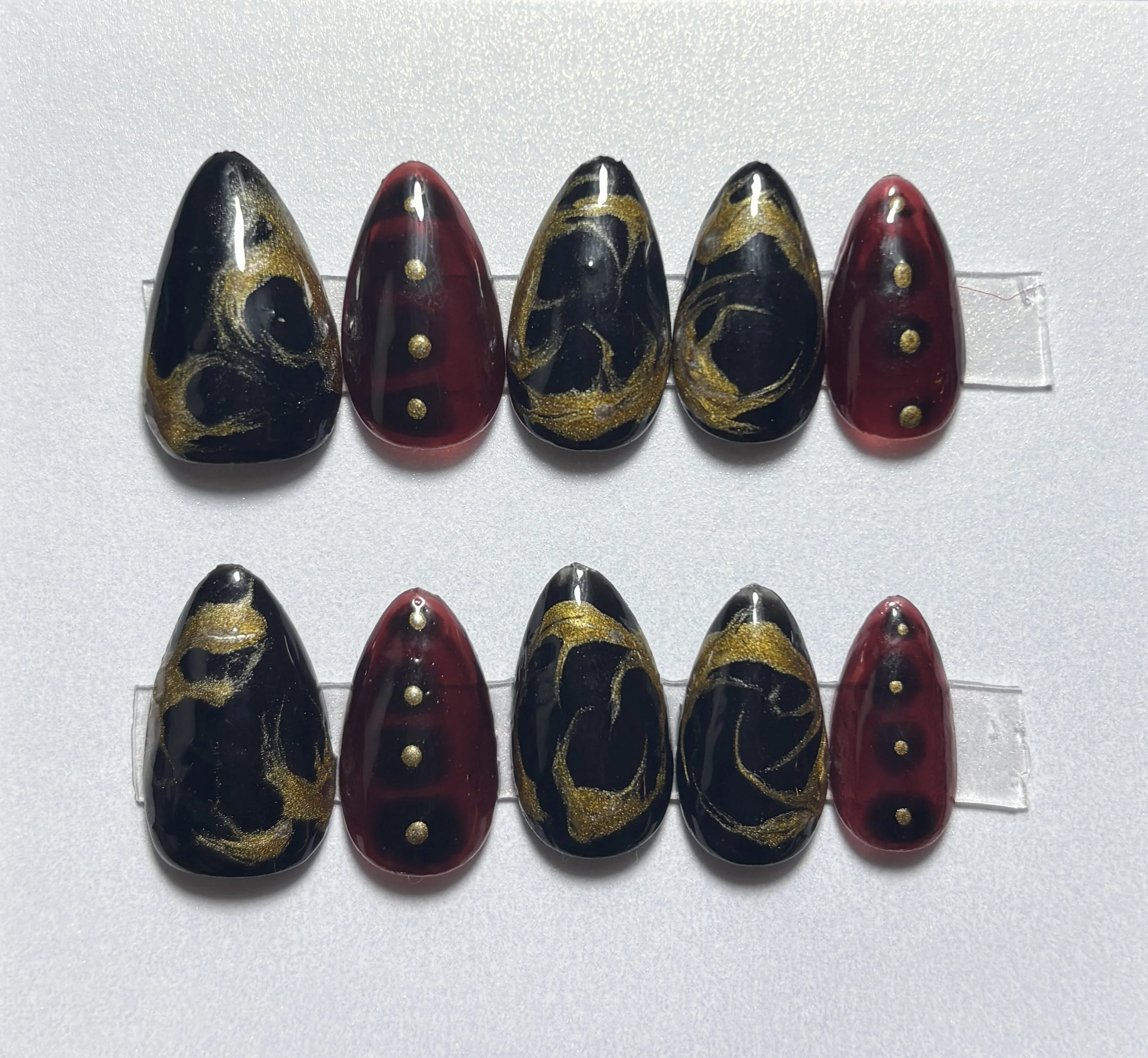 Black, red, and gold